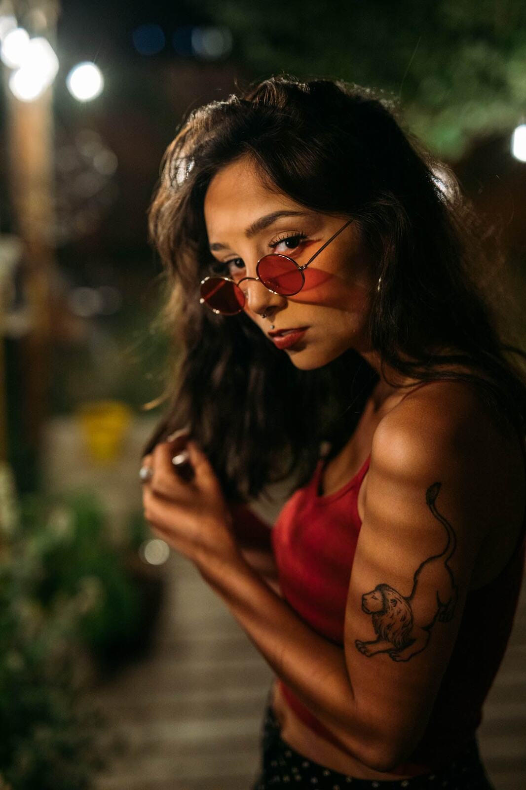 Angelica in Warm Shadow story frame 2: Red sunglasses, warm rooms, deck lights and close portraits from a more intimate portrait session.