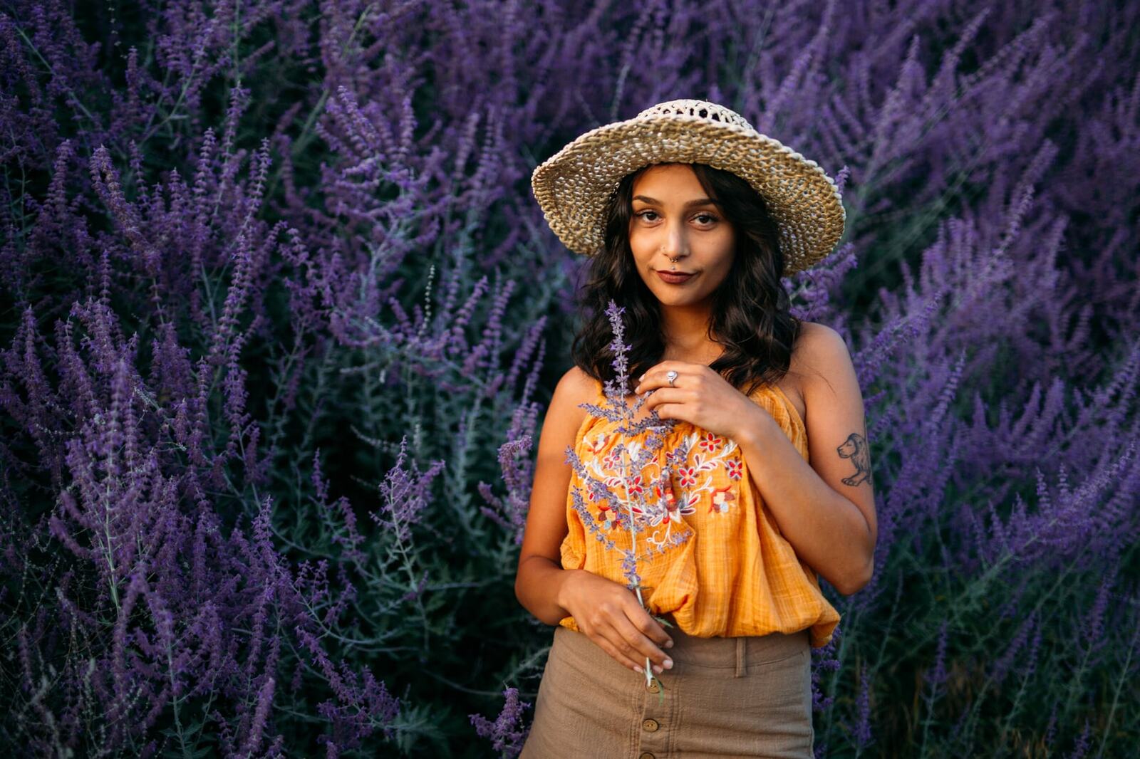 Angelica in Garden Light story frame 15: Mirror play, garden colour, straw hat and reflective frames with a quieter kind of romance.