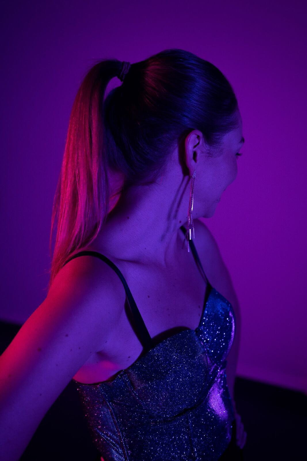 Angela in Colour portraits story frame 37: Angela in a colourful studio portrait set with clean expression, styled wardrobe, controlled light and a polished creative-portrait feel.