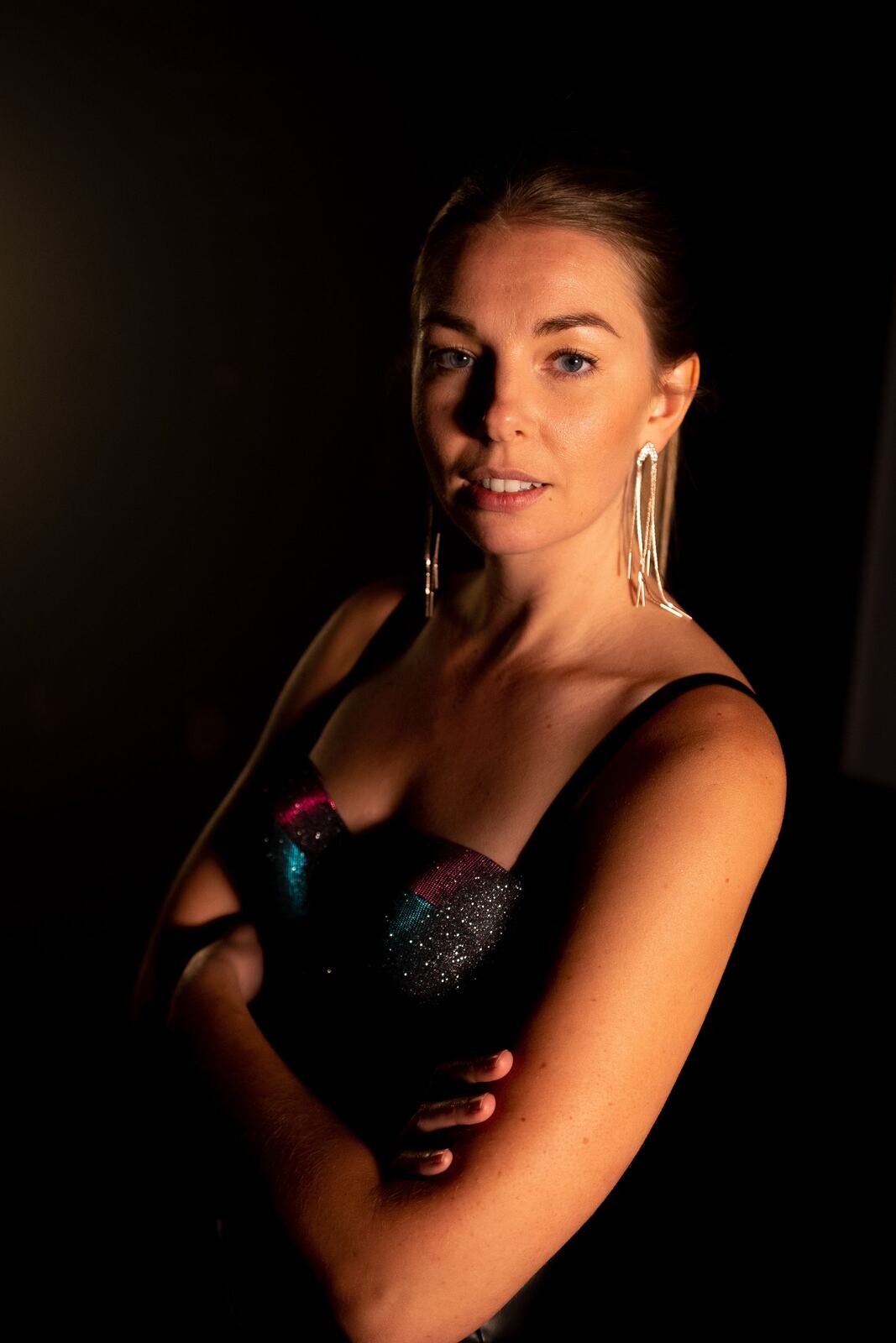 Angela in Colour portraits story frame 47: Angela in a colourful studio portrait set with clean expression, styled wardrobe, controlled light and a polished creative-portrait feel.