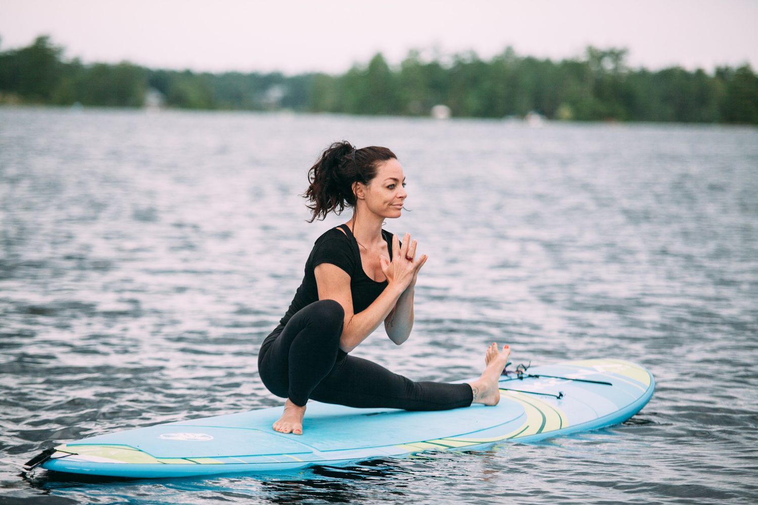 Ash and Jill, SUP Yoga corporate story frame 13: Corporate lifestyle photography for Ash and Jill on stand-up paddleboards, with yoga movement, instructor portraits and lake-based imagery for a wellness business.