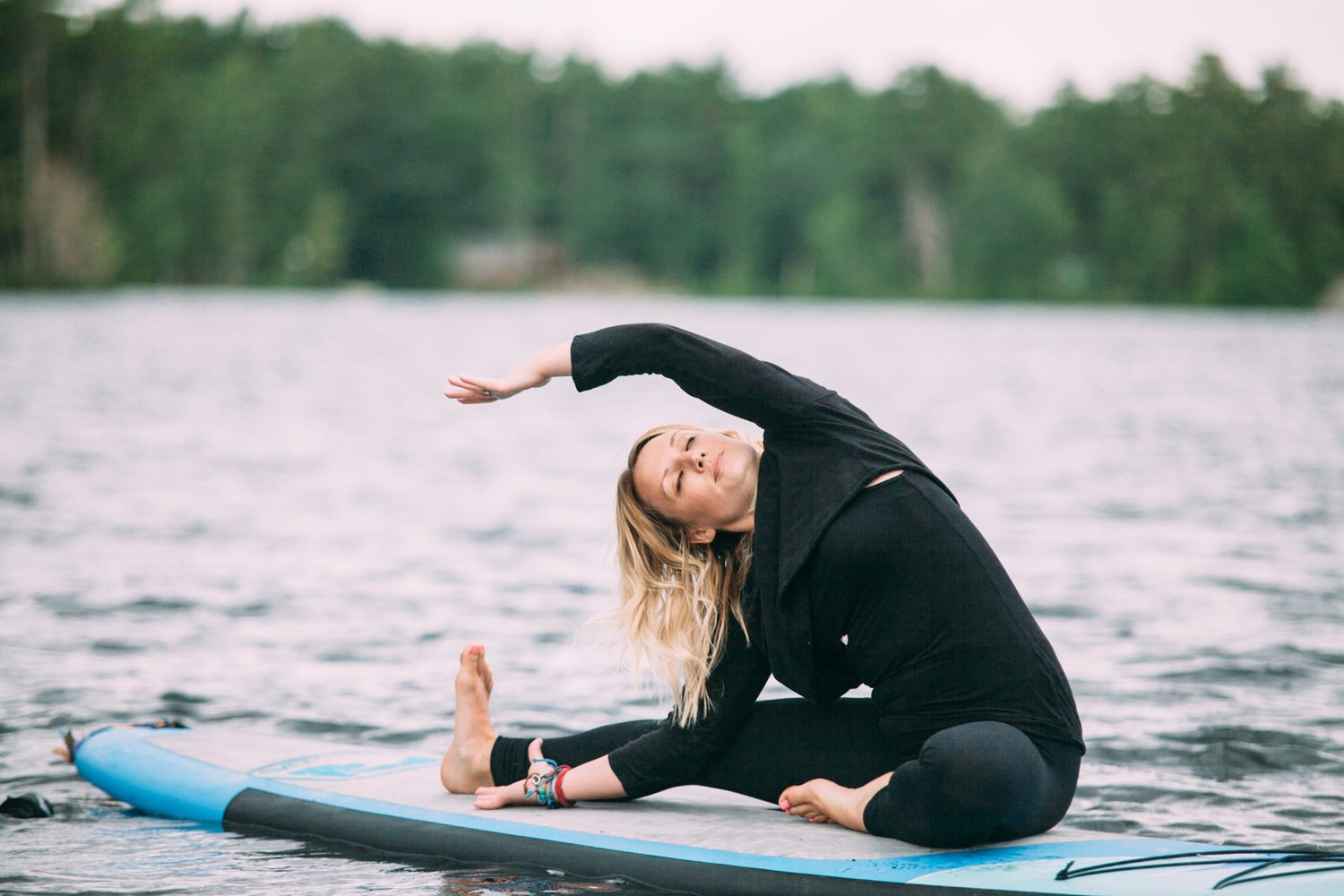Ash and Jill, SUP Yoga corporate story frame 14: Corporate lifestyle photography for Ash and Jill on stand-up paddleboards, with yoga movement, instructor portraits and lake-based imagery for a wellness business.
