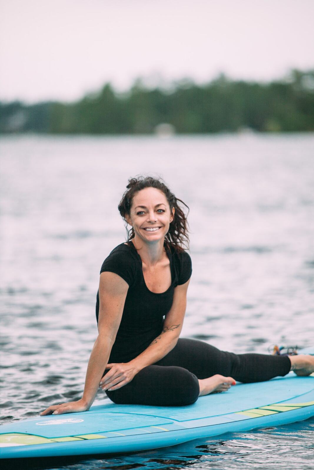Ash and Jill, SUP Yoga corporate story frame 15: Corporate lifestyle photography for Ash and Jill on stand-up paddleboards, with yoga movement, instructor portraits and lake-based imagery for a wellness business.