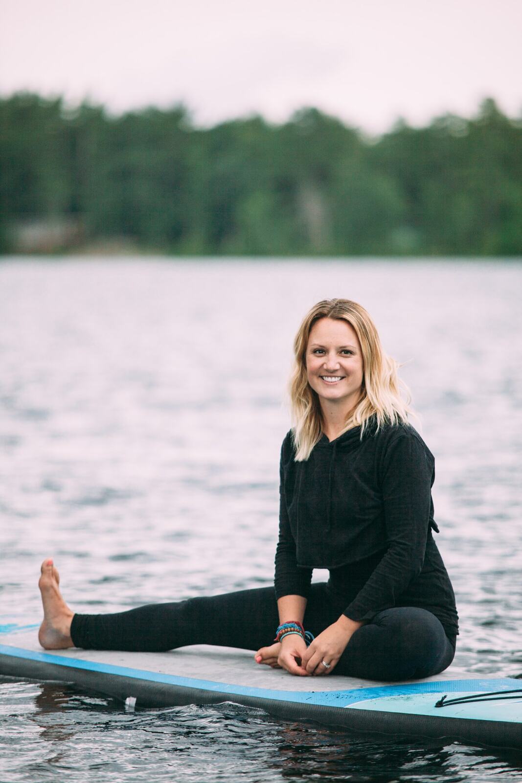 Ash and Jill, SUP Yoga corporate story frame 16: Corporate lifestyle photography for Ash and Jill on stand-up paddleboards, with yoga movement, instructor portraits and lake-based imagery for a wellness business.