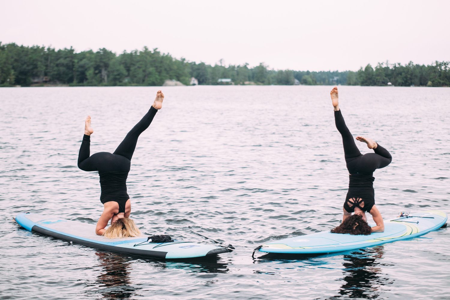 Ash and Jill, SUP Yoga corporate story frame 22: Corporate lifestyle photography for Ash and Jill on stand-up paddleboards, with yoga movement, instructor portraits and lake-based imagery for a wellness business.