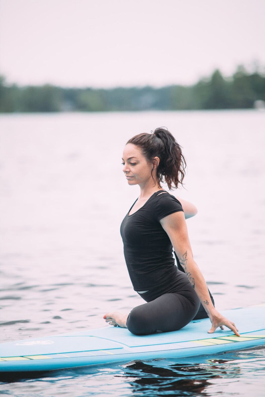 Ash and Jill, SUP Yoga corporate story frame 23: Corporate lifestyle photography for Ash and Jill on stand-up paddleboards, with yoga movement, instructor portraits and lake-based imagery for a wellness business.