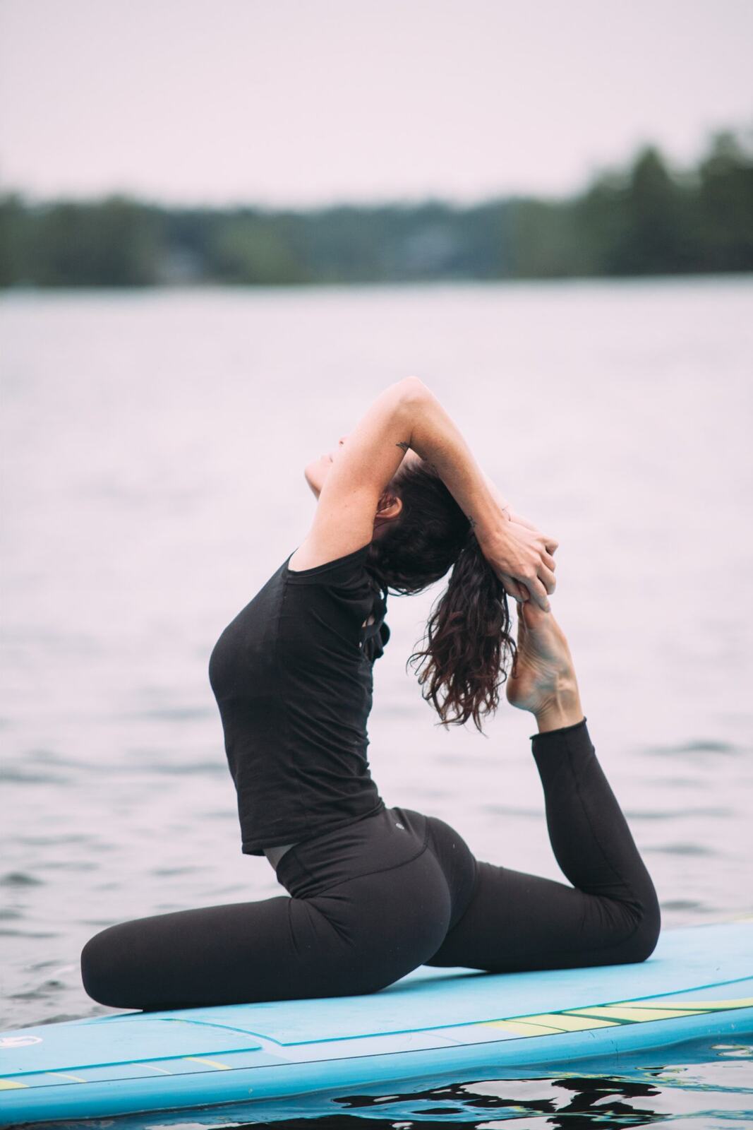 Ash and Jill, SUP Yoga corporate story frame 24: Corporate lifestyle photography for Ash and Jill on stand-up paddleboards, with yoga movement, instructor portraits and lake-based imagery for a wellness business.