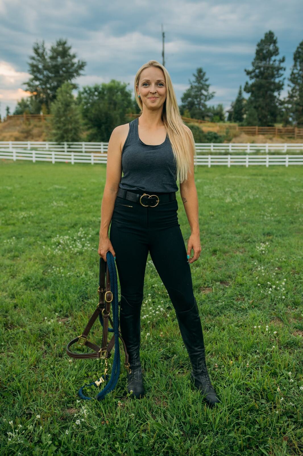 Ashton at the Ranch portraits story frame 10: Ranch portraits for Ashton in Kelowna, with horses, open pasture, quiet country styling and Okanagan light shaped into a grounded portrait story.