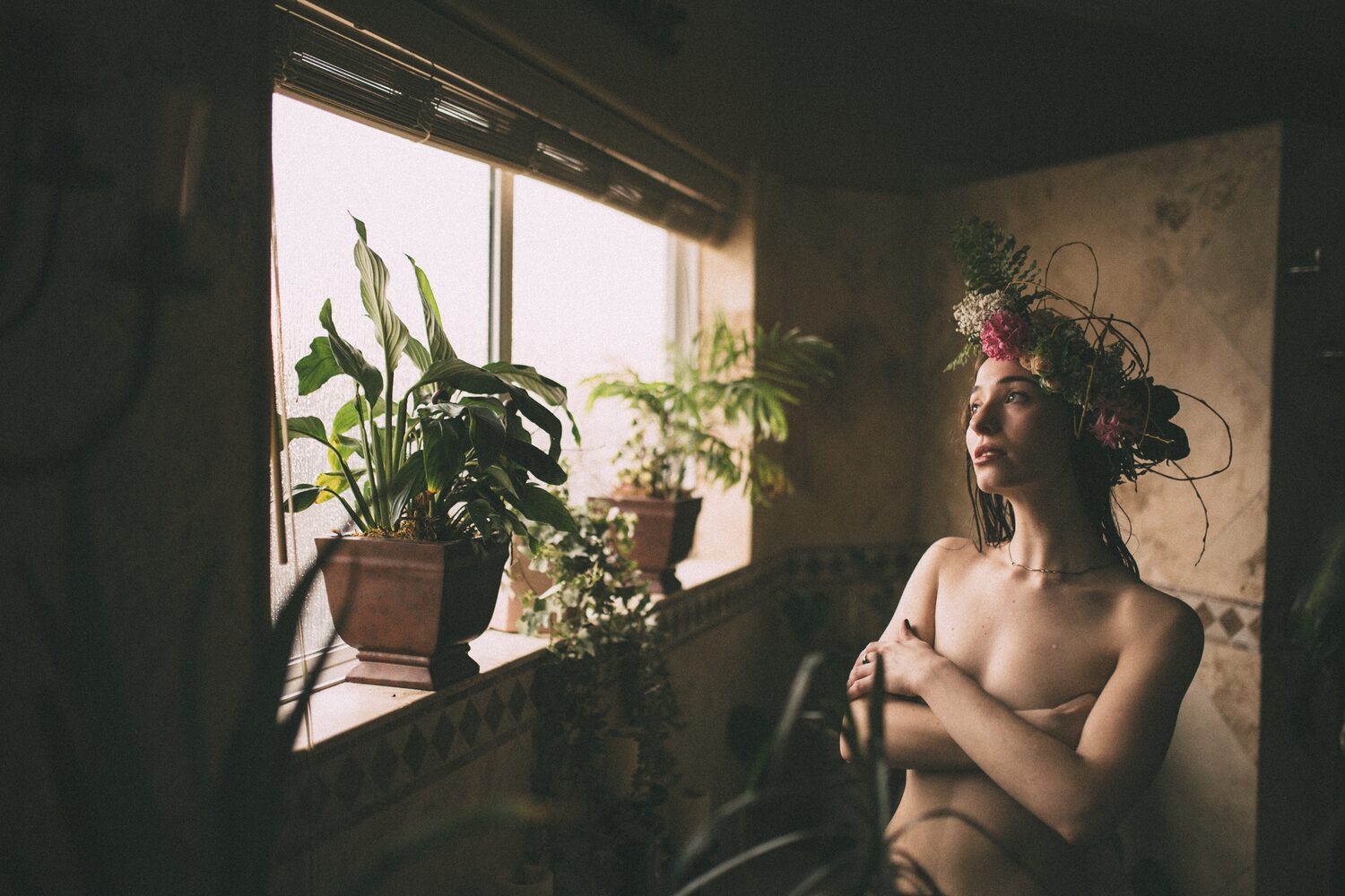 Bailey in Kelowna portraits story frame 35: Two portrait sessions moving through window light, body line, bold colour, foliage and floral-bath portraits.