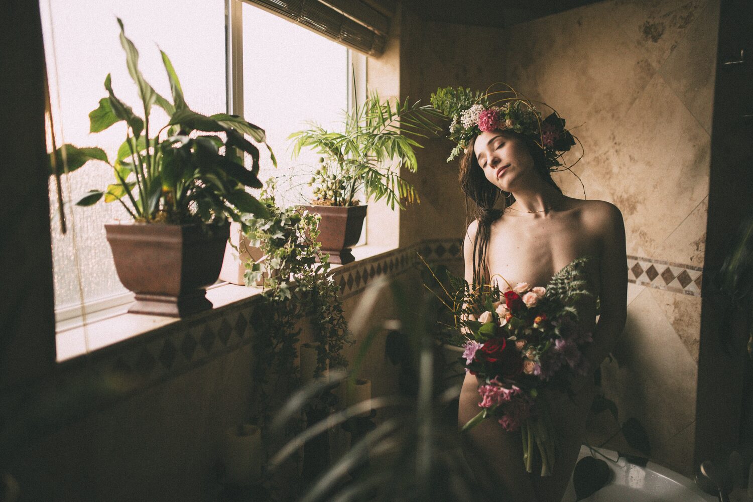 Bailey in Kelowna portraits story frame 40: Two portrait sessions moving through window light, body line, bold colour, foliage and floral-bath portraits.