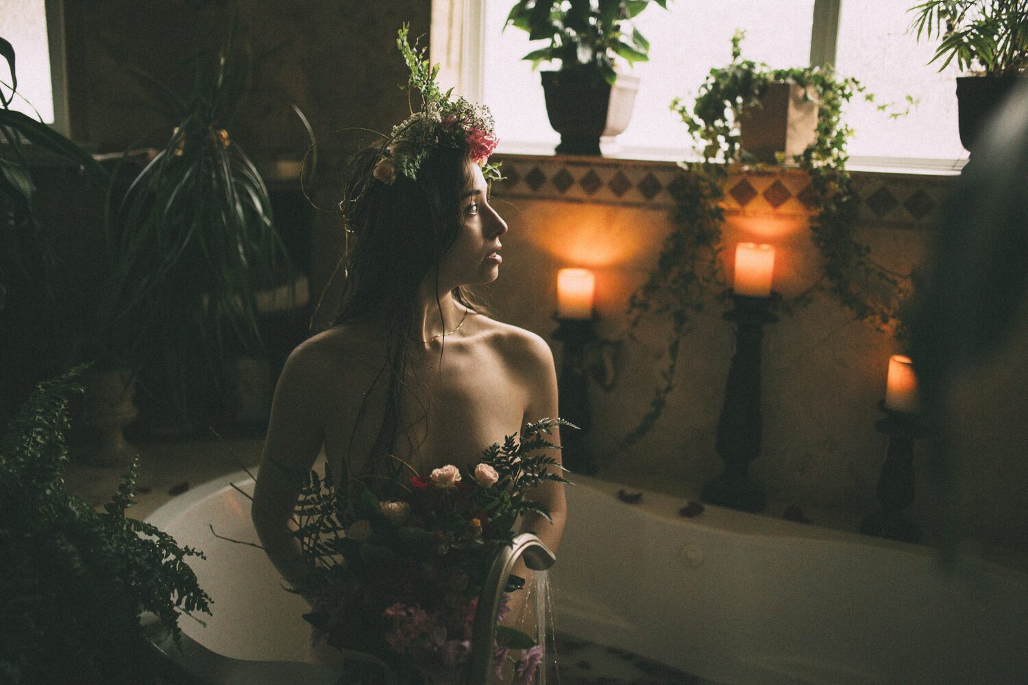Bailey in Kelowna portraits story frame 42: Two portrait sessions moving through window light, body line, bold colour, foliage and floral-bath portraits.