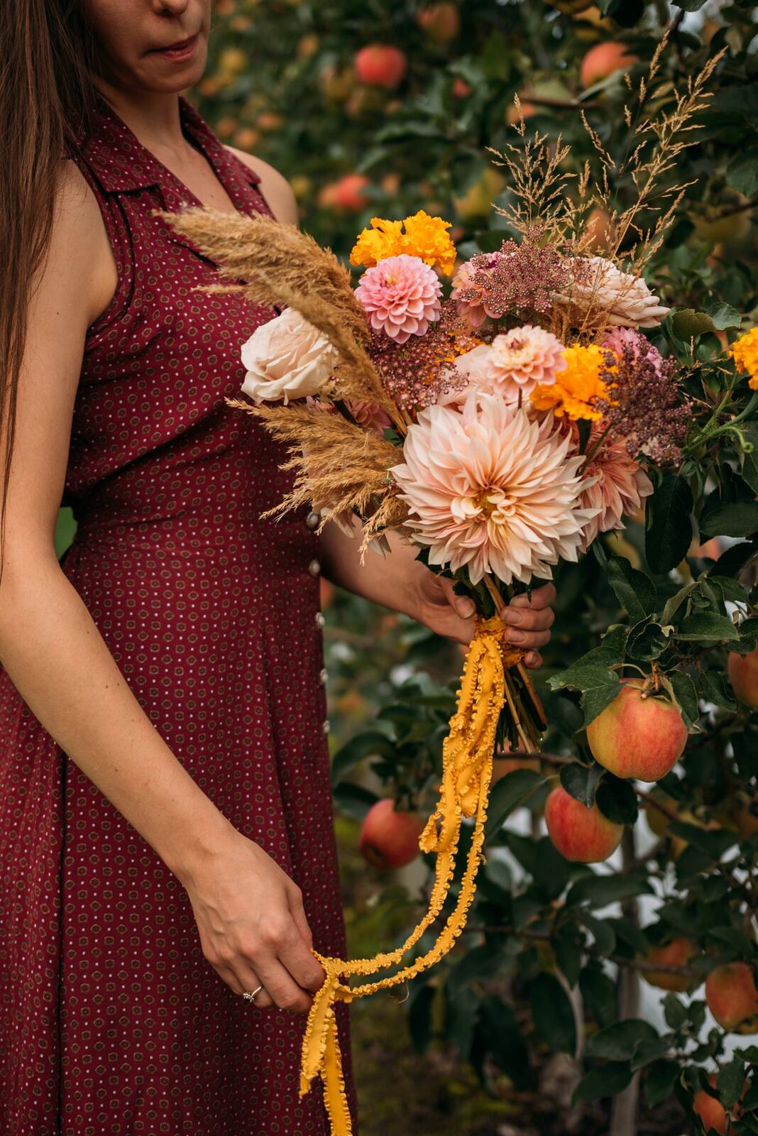 Bailley of Gems & Stems corporate story frame 3: Brand photography for Bailley of Gems & Stems in Oliver, BC, with flowers, owner portraits, Eastside signage, shop details and warm maker-led business imagery..