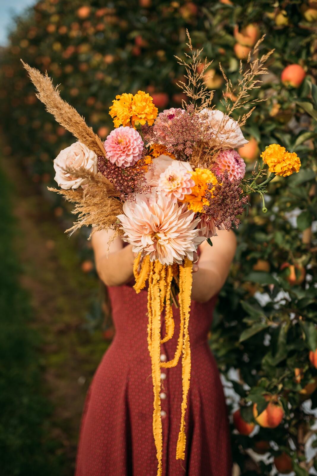 Bailley of Gems & Stems corporate story frame 8: Brand photography for Bailley of Gems & Stems in Oliver, BC, with flowers, owner portraits, Eastside signage, shop details and warm maker-led business imagery..