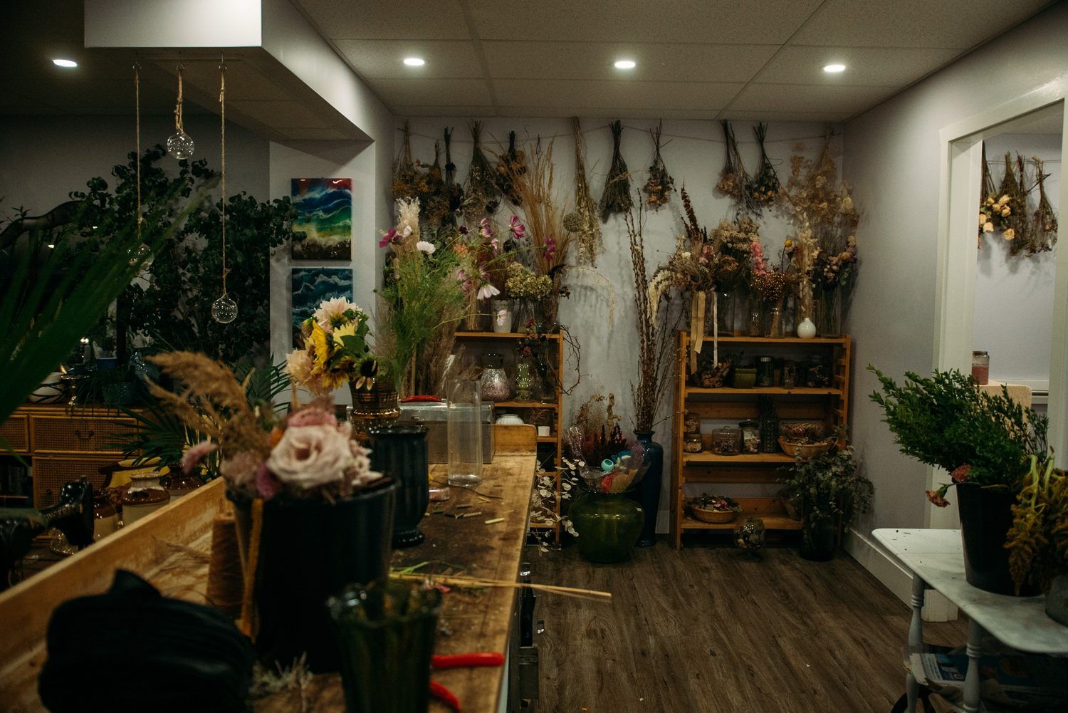 Bailley of Gems & Stems corporate story frame 20: Brand photography for Bailley of Gems & Stems in Oliver, BC, with flowers, owner portraits, Eastside signage, shop details and warm maker-led business imagery..