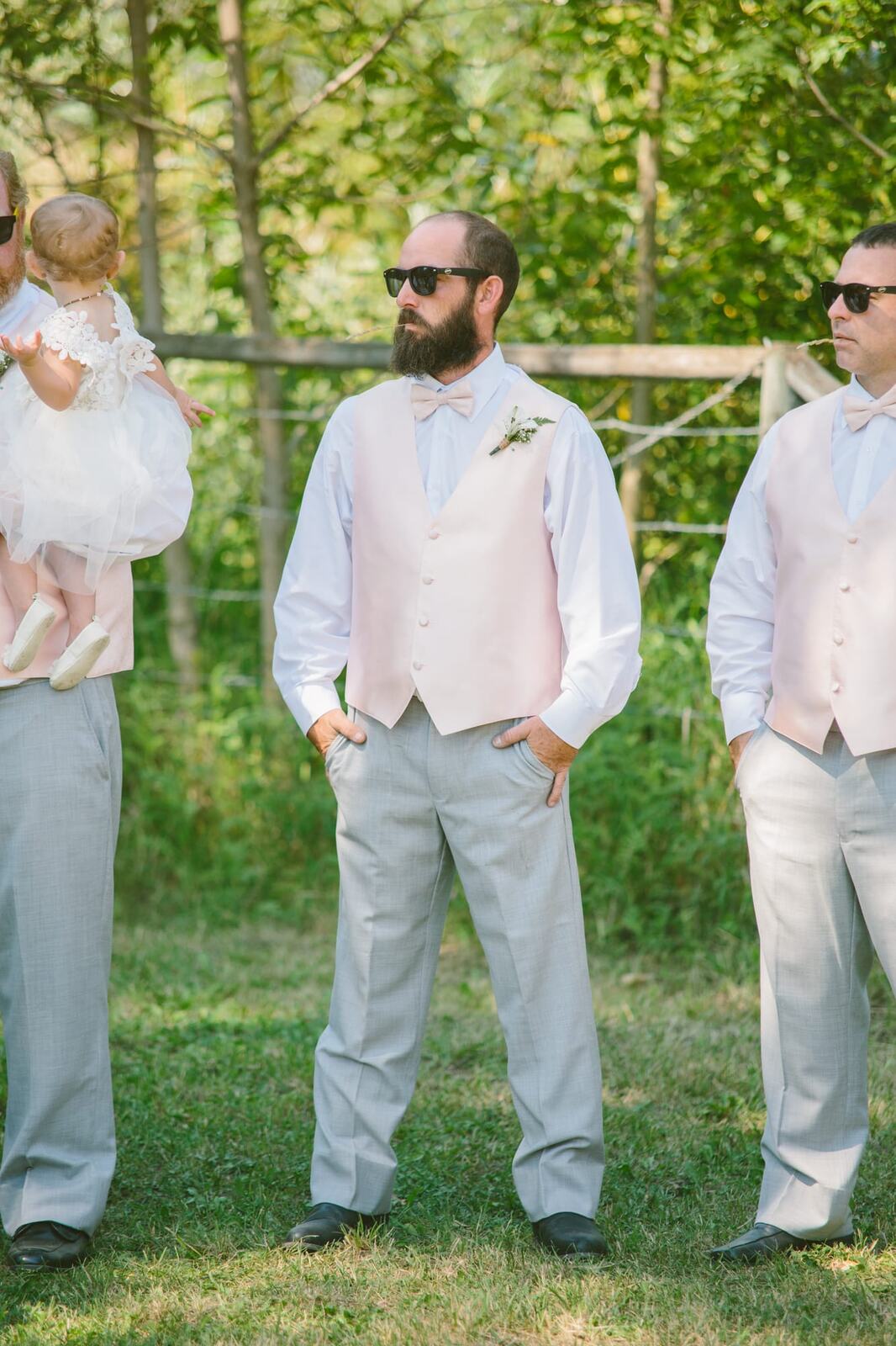 Barbara and Ryan weddings story frame 13: A Salmon Arm wedding near Mount Ida, moving from a private yard to Marine Peace Park and wharf portraits, with the groom's trucking life part of the story..
