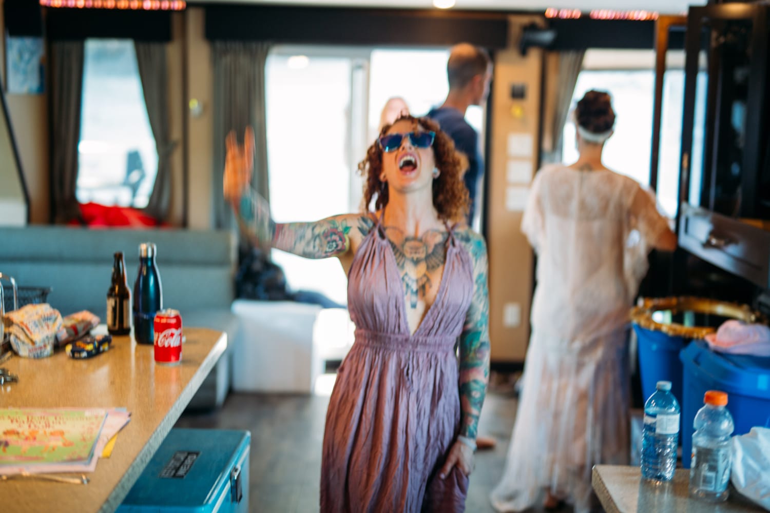 Carmel and Chris weddings story frame 13: A Sicamous and Shuswap Lake houseboat wedding that moved from water to beach, with friend-community overlap and a relaxed lakeside feeling..