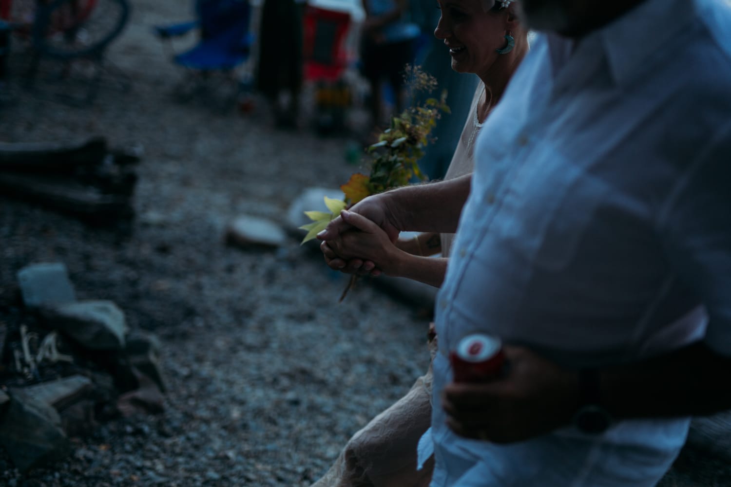Carmel and Chris weddings story frame 14: A Sicamous and Shuswap Lake houseboat wedding that moved from water to beach, with friend-community overlap and a relaxed lakeside feeling..
