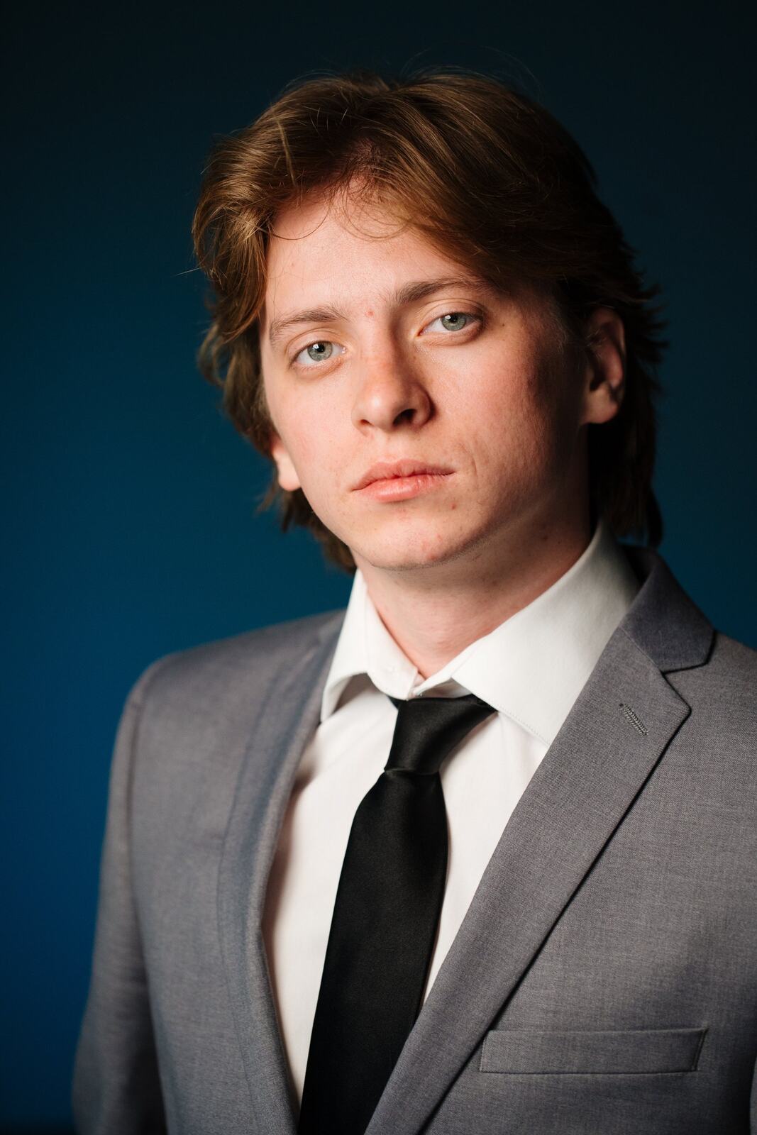 CATO Redux actor headshot on blue, photograph 4