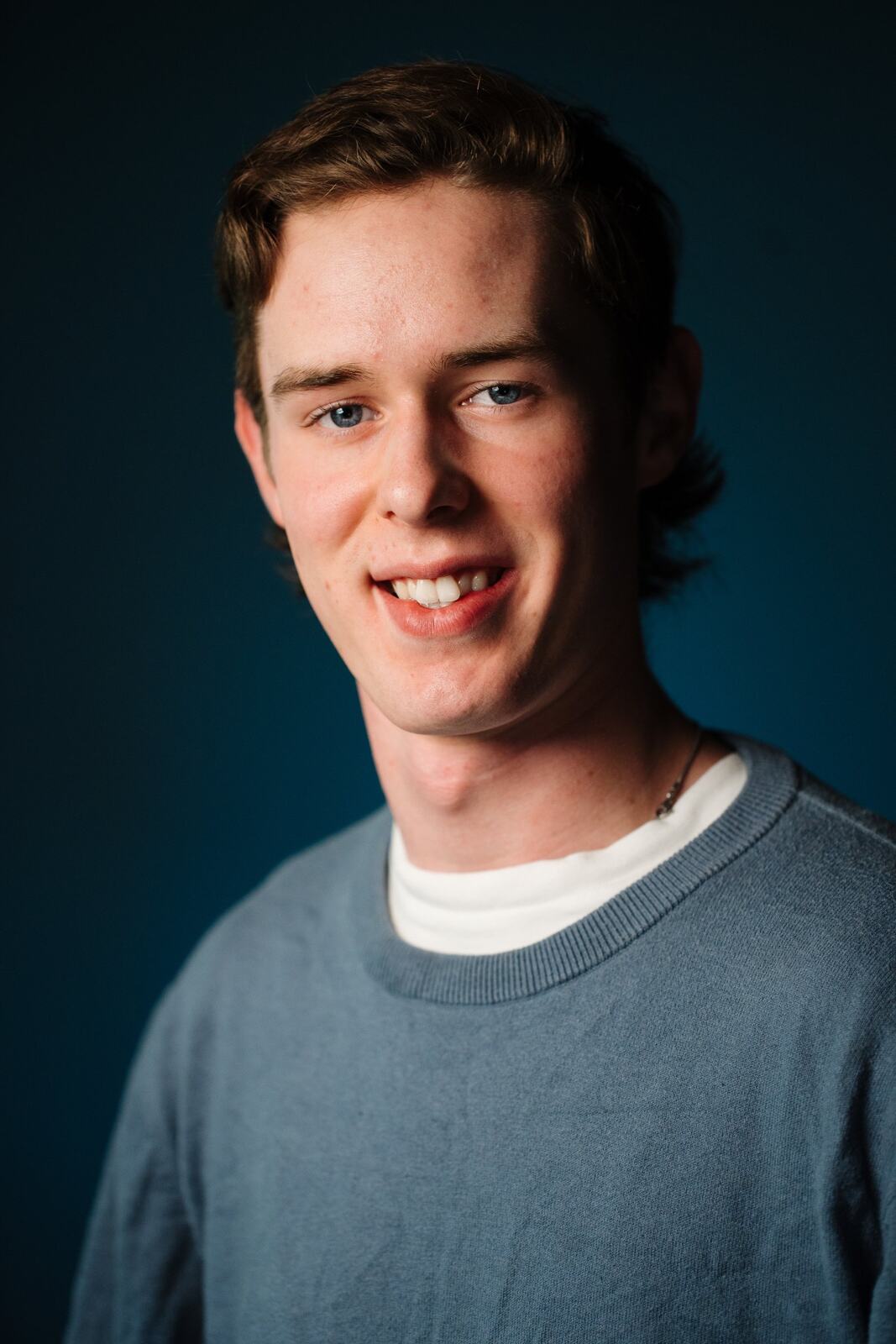 CATO Redux actor headshot on blue, photograph 28