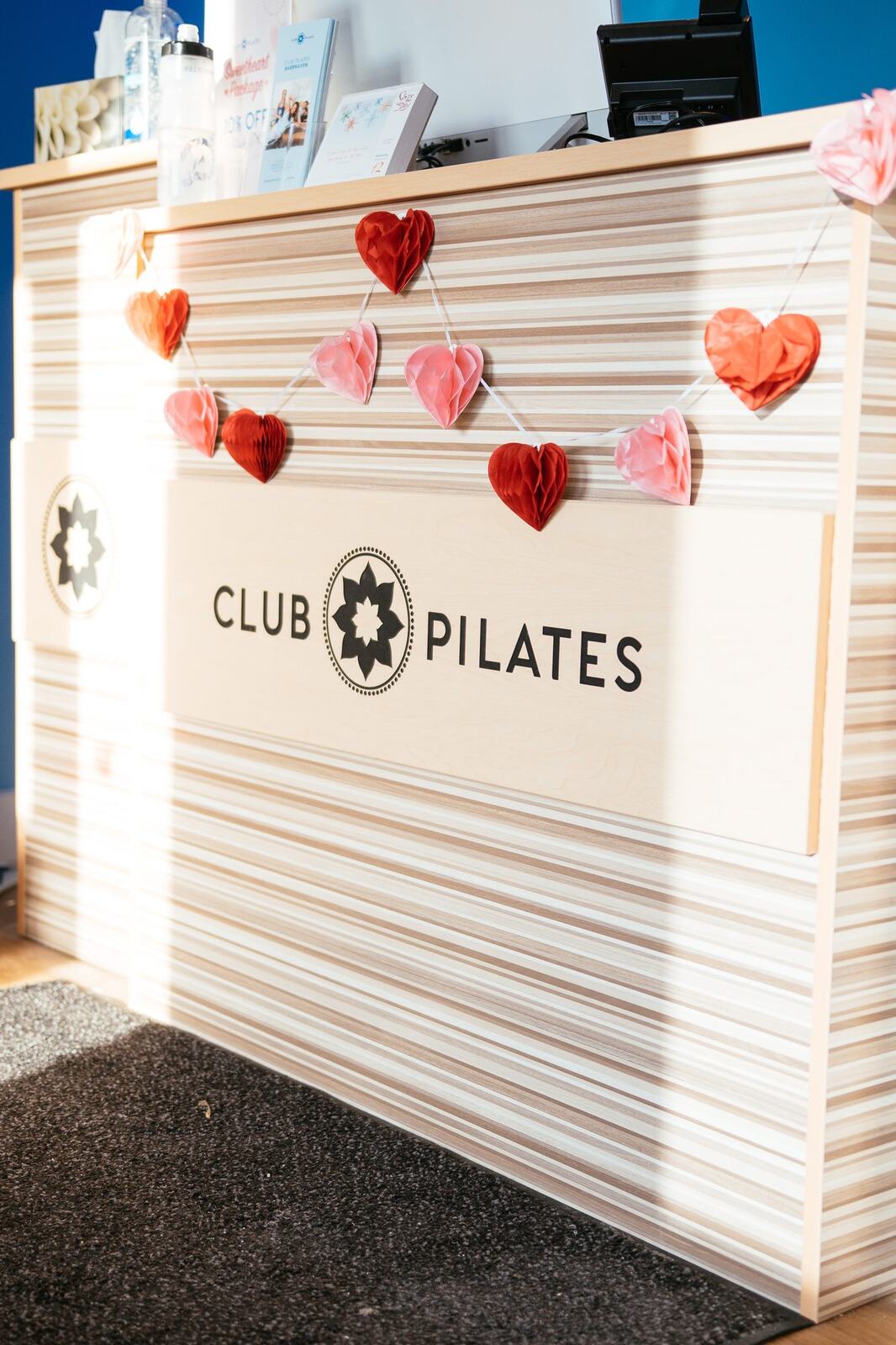 Club Pilates Barrhaven corporate story frame 5: Brand photography for Club Pilates Barrhaven in the Ottawa area, with studio interiors, staff portraits, private training rooms, equipment details and class movement for local marketing..