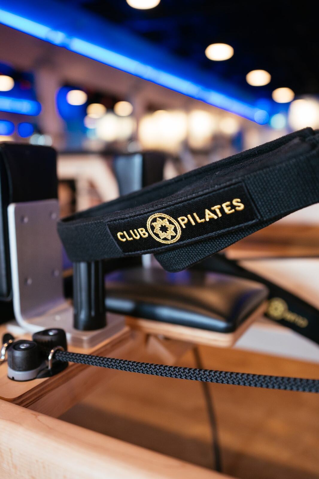Club Pilates Barrhaven corporate story frame 11: Brand photography for Club Pilates Barrhaven in the Ottawa area, with studio interiors, staff portraits, private training rooms, equipment details and class movement for local marketing..