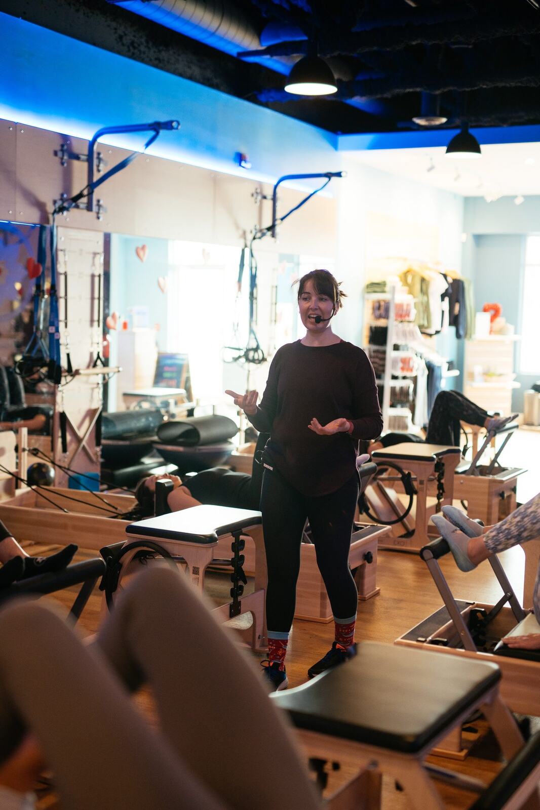Club Pilates Barrhaven corporate story frame 28: Brand photography for Club Pilates Barrhaven in the Ottawa area, with studio interiors, staff portraits, private training rooms, equipment details and class movement for local marketing..