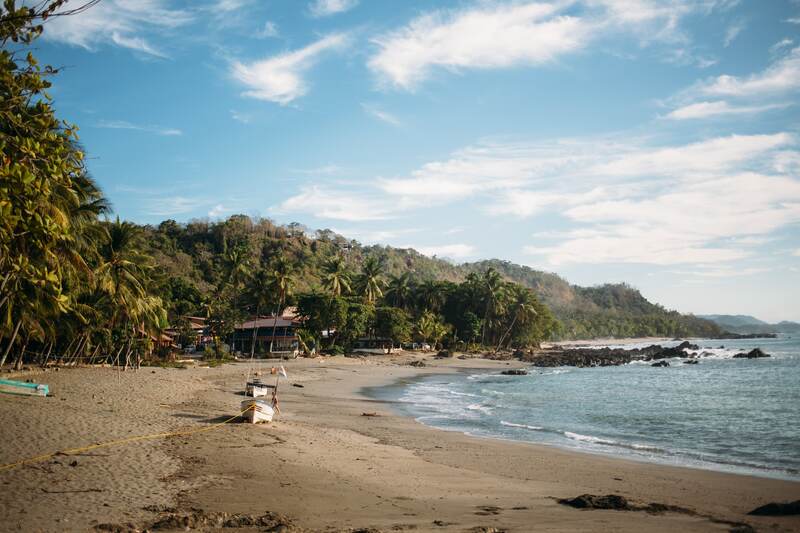 Costa Rica Afterglow story frame 8: A small Costa Rica travel sequence with ocean dusk, palms, jungle paths, waterfall light and print-minded details.