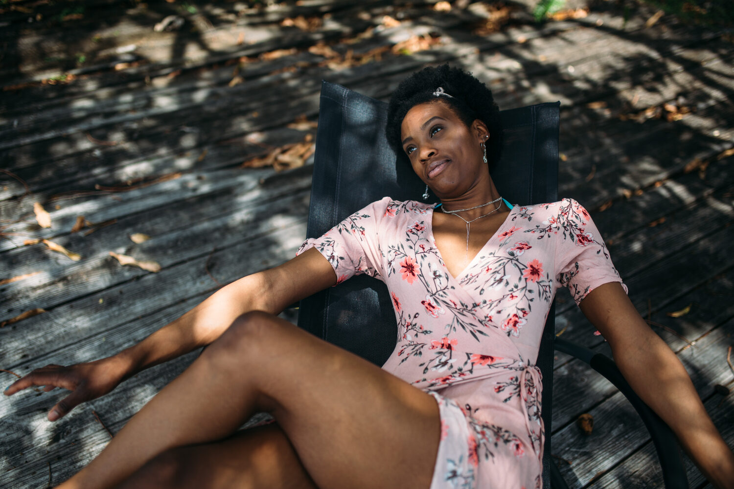 Dee-J in Miami portraits story frame 9: Two days with Dee-J in Miami, moving from a bright poolside portrait story to a second pool sequence and green-dress portraits along the riverbank.