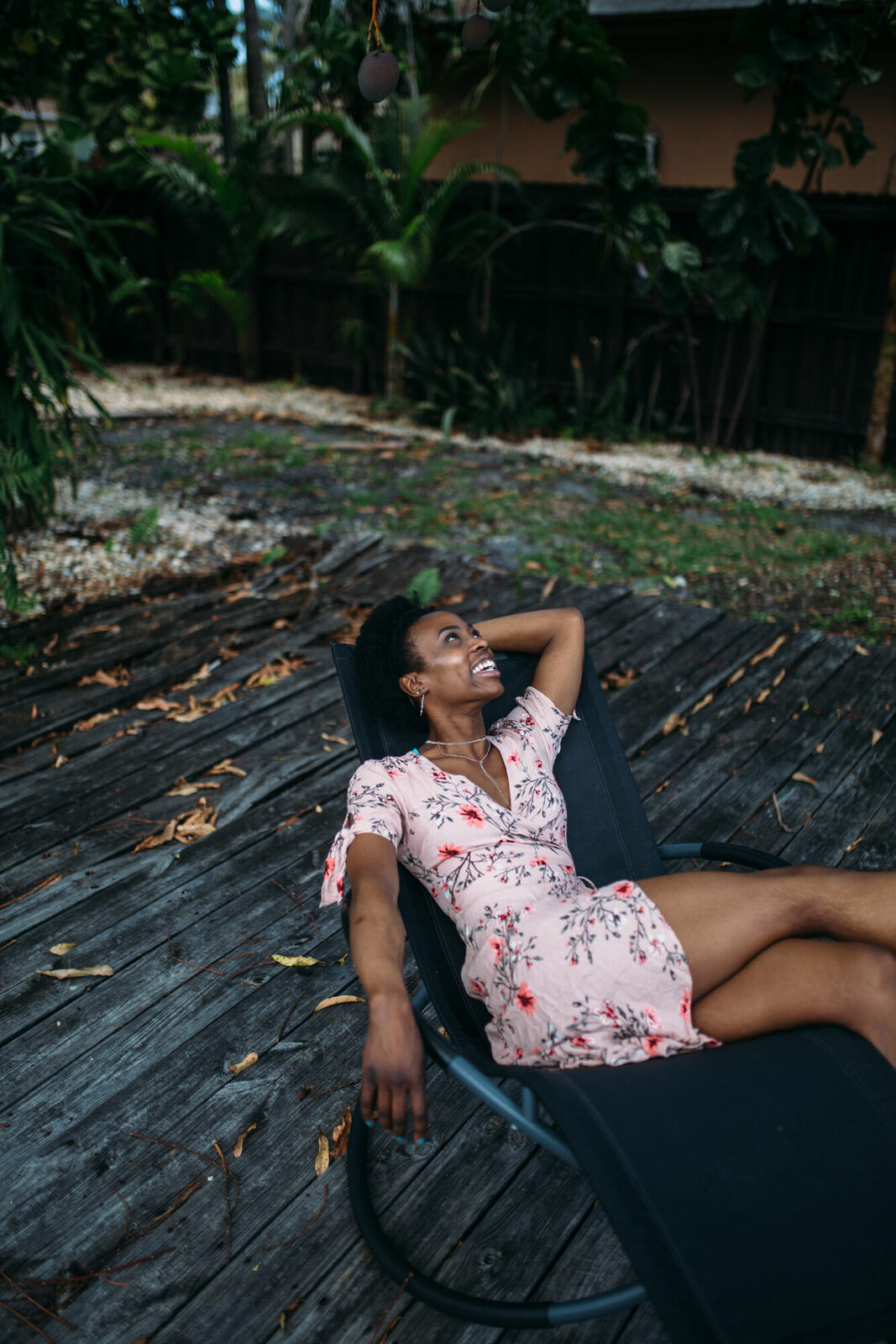 Dee-J in Miami portraits story frame 12: Two days with Dee-J in Miami, moving from a bright poolside portrait story to a second pool sequence and green-dress portraits along the riverbank.