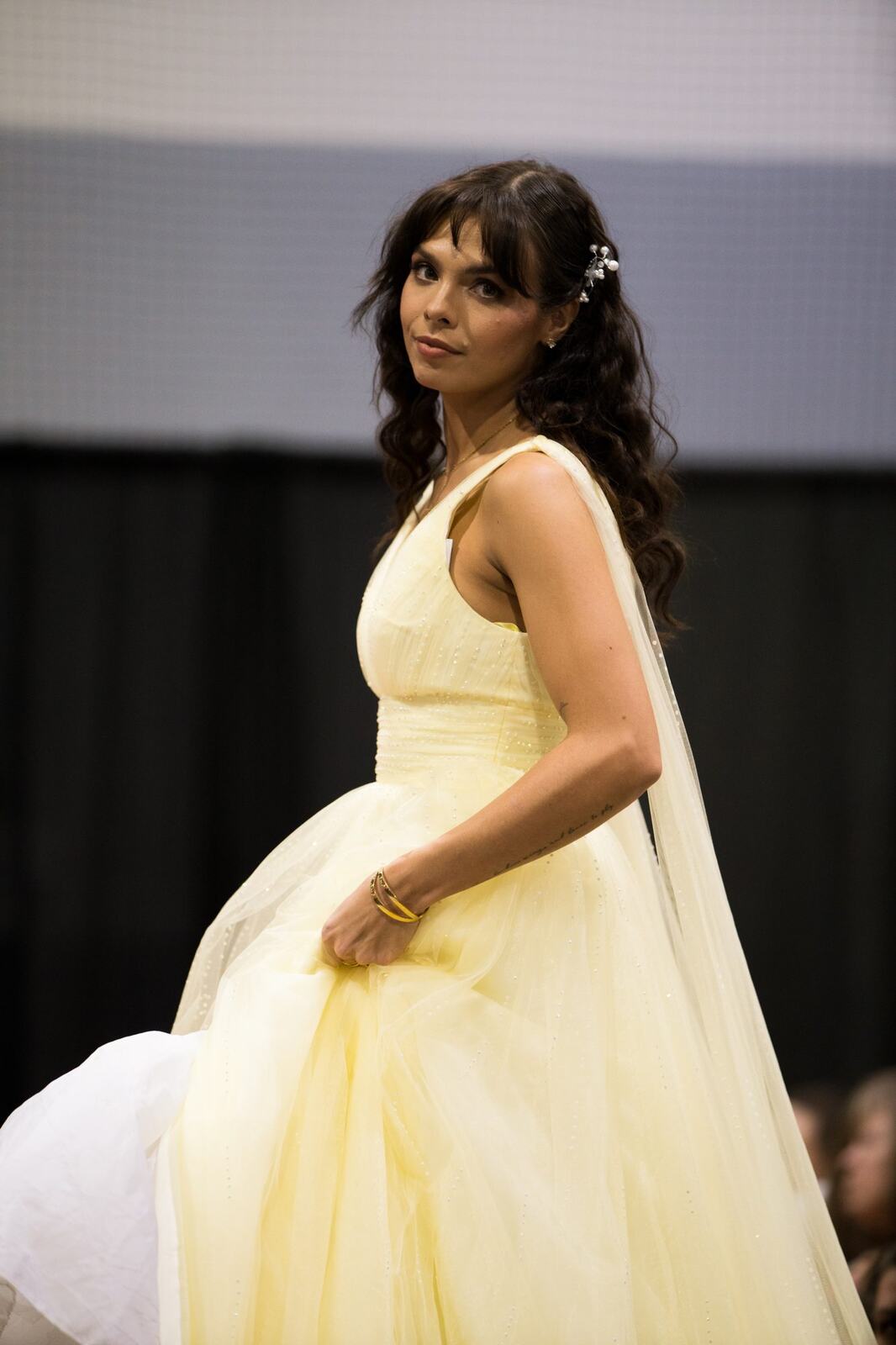 Diva Den at Kelowna Bridal Extravaganza corporate story frame 28: Runway and bridal beauty photography for Diva Den Day Spa at Kelowna Bridal Extravaganza, with women-focused looks from Sunny, Montana, Elena, Beth and Sky for Okanagan wedding and beauty brands..