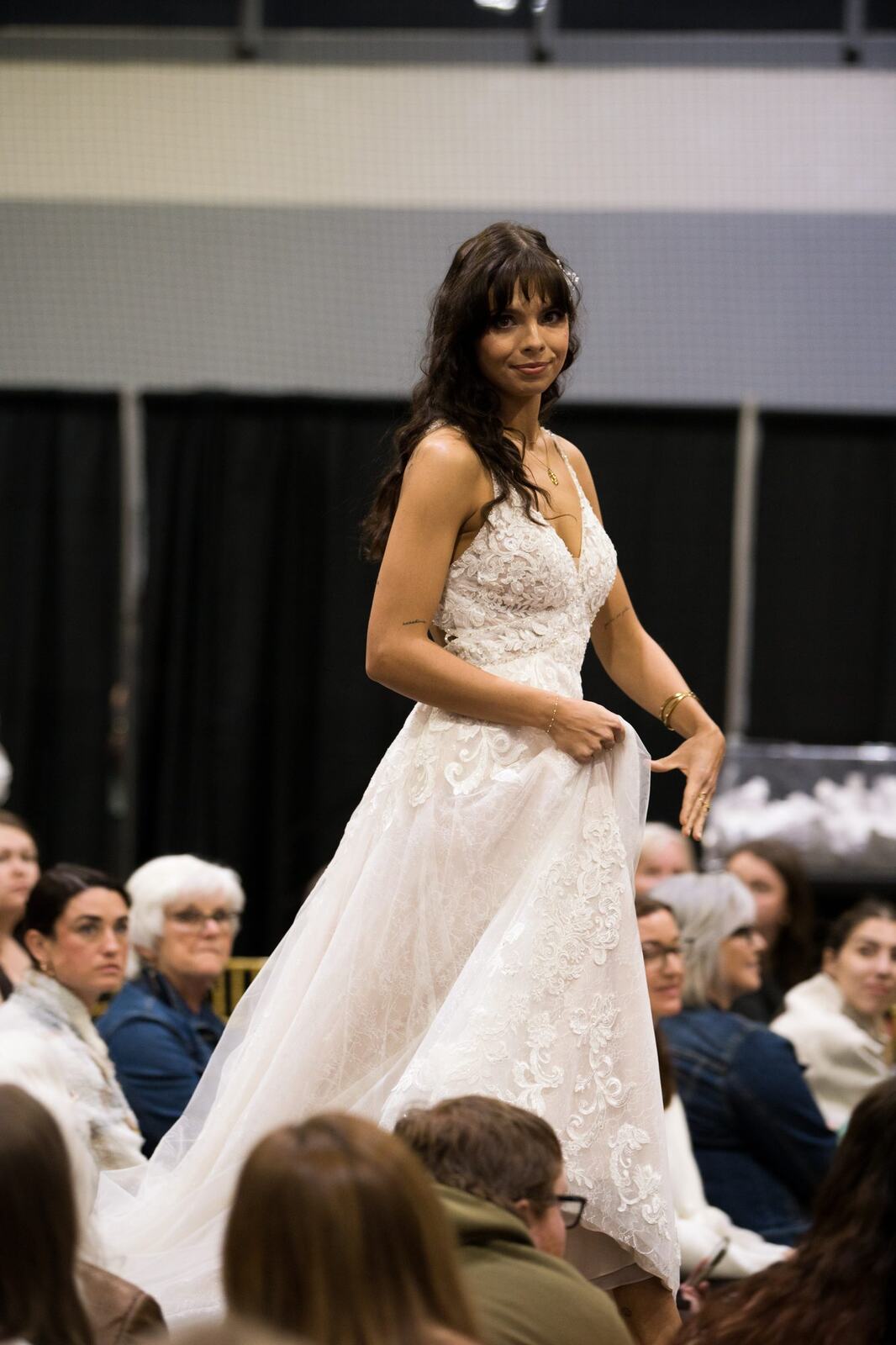 Diva Den at Kelowna Bridal Extravaganza corporate story frame 32: Runway and bridal beauty photography for Diva Den Day Spa at Kelowna Bridal Extravaganza, with women-focused looks from Sunny, Montana, Elena, Beth and Sky for Okanagan wedding and beauty brands..