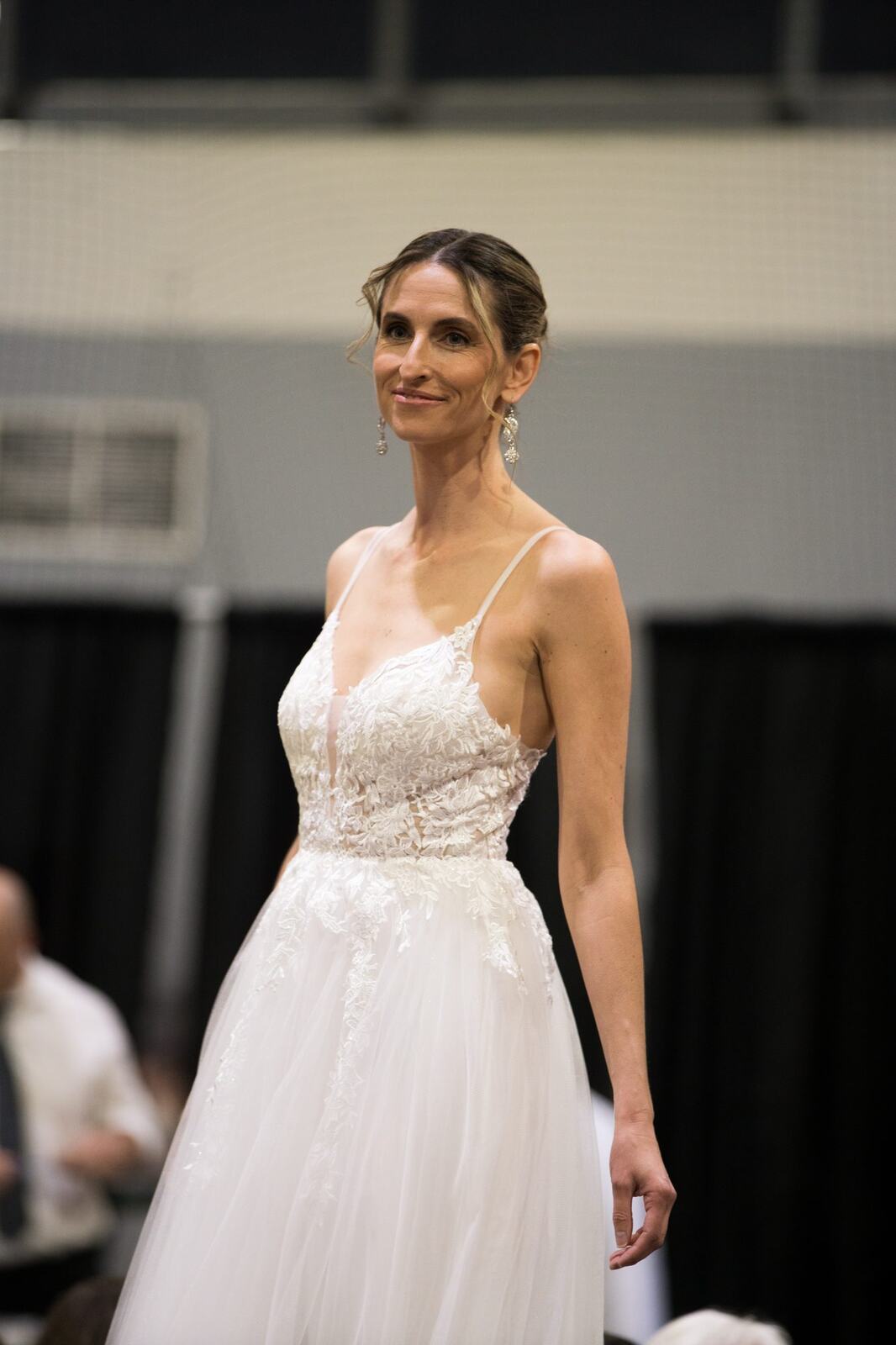 Diva Den at Kelowna Bridal Extravaganza corporate story frame 34: Runway and bridal beauty photography for Diva Den Day Spa at Kelowna Bridal Extravaganza, with women-focused looks from Sunny, Montana, Elena, Beth and Sky for Okanagan wedding and beauty brands..