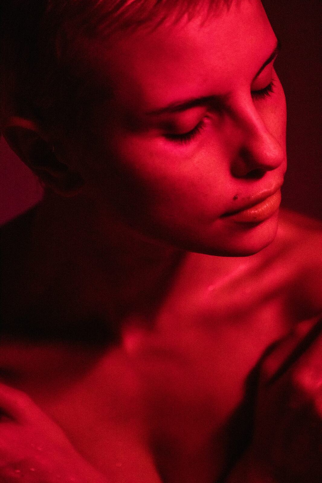 Float Space corporate story frame 21: A Float Space brand story with staff portraits, wellness atmosphere, red-light portrait texture and campaign-ready business imagery..