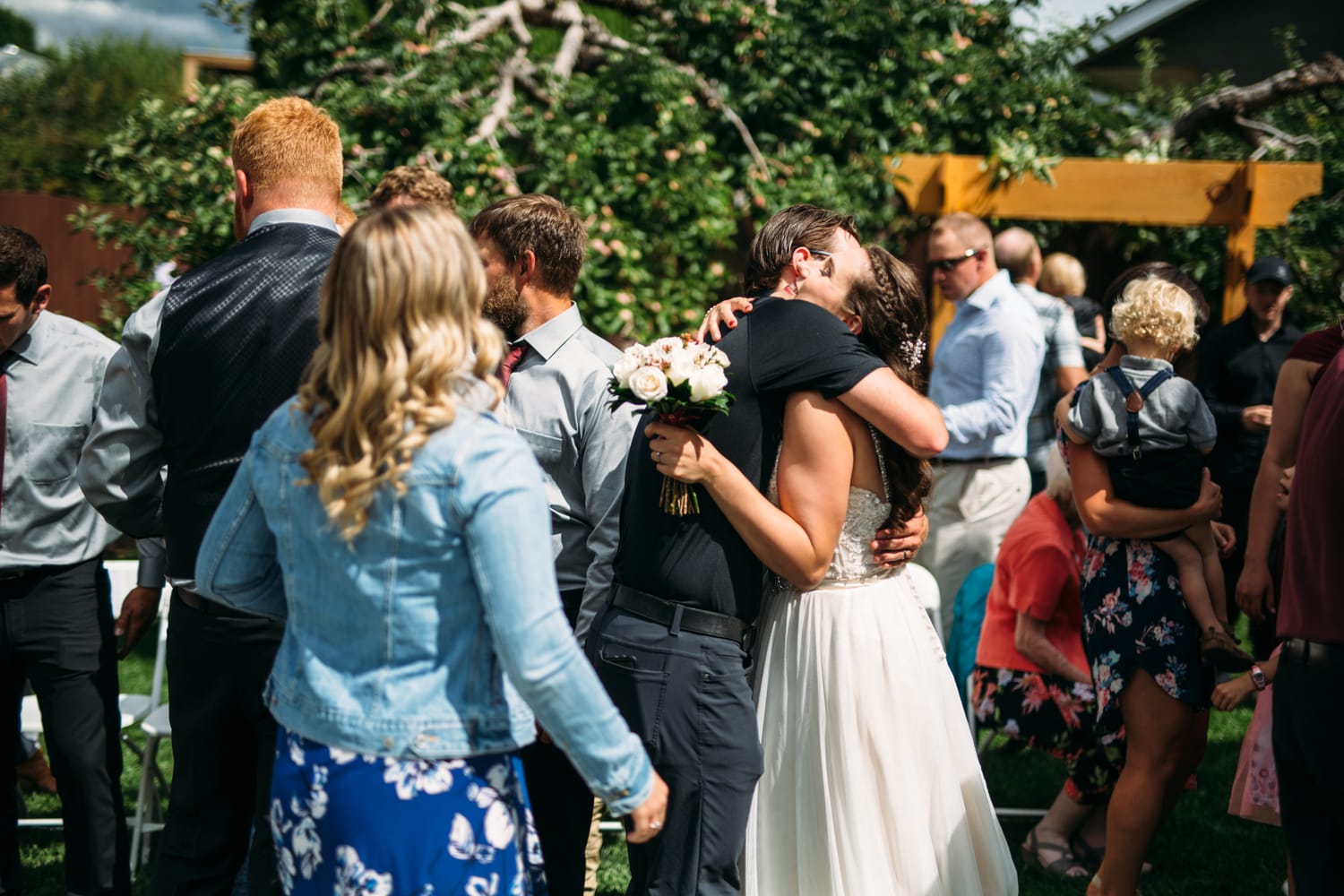 Hannah and Max weddings story frame 13: A private backyard wedding in Kamloops, with family closeness, friend energy, weather and detail moments that keep the day alive..