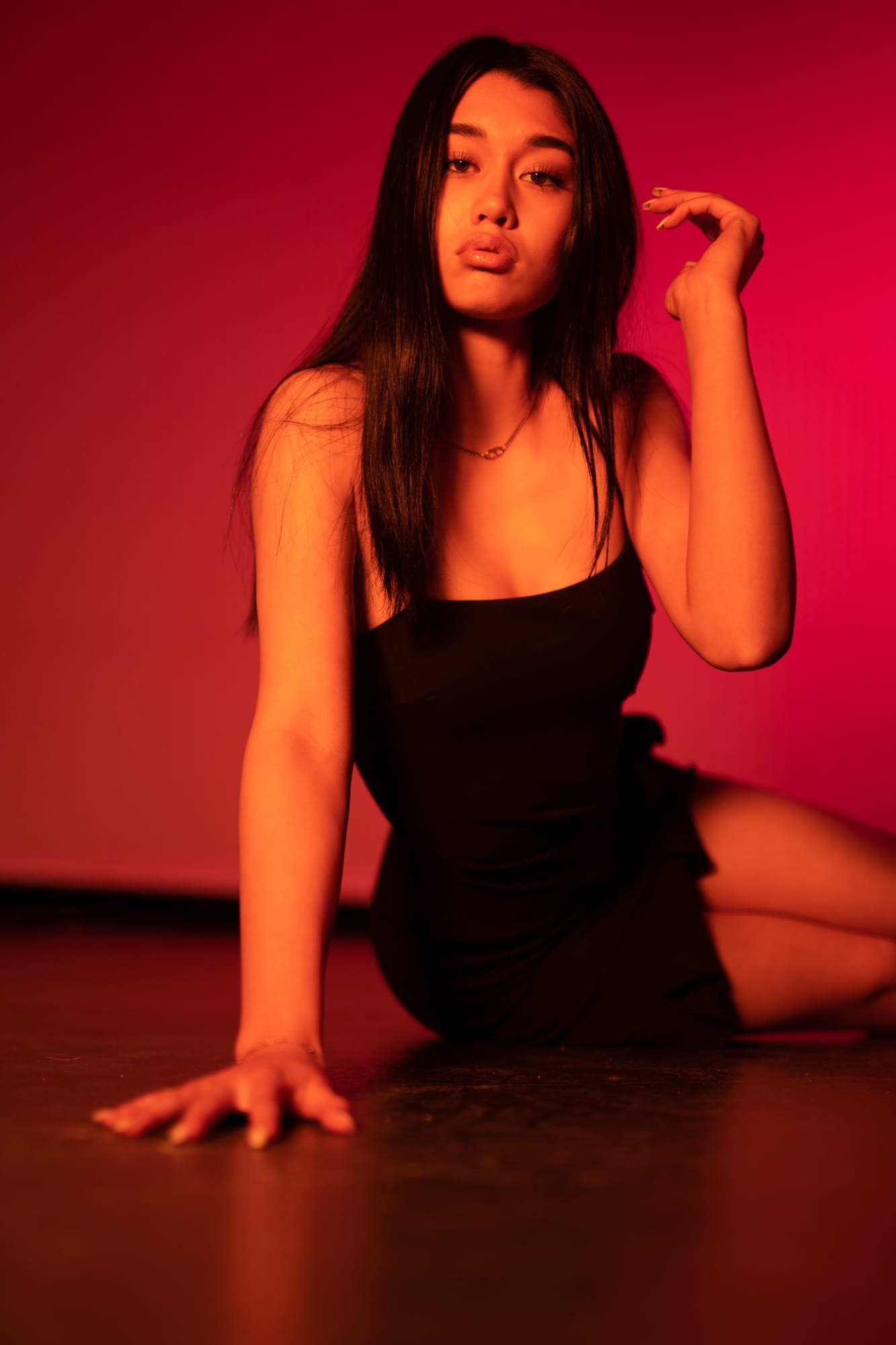 Julia Studio Portraits portraits story frame 13: Julia in a studio portrait session with creative wardrobe, controlled colour, performer-friendly direction and polished artist-profile range.