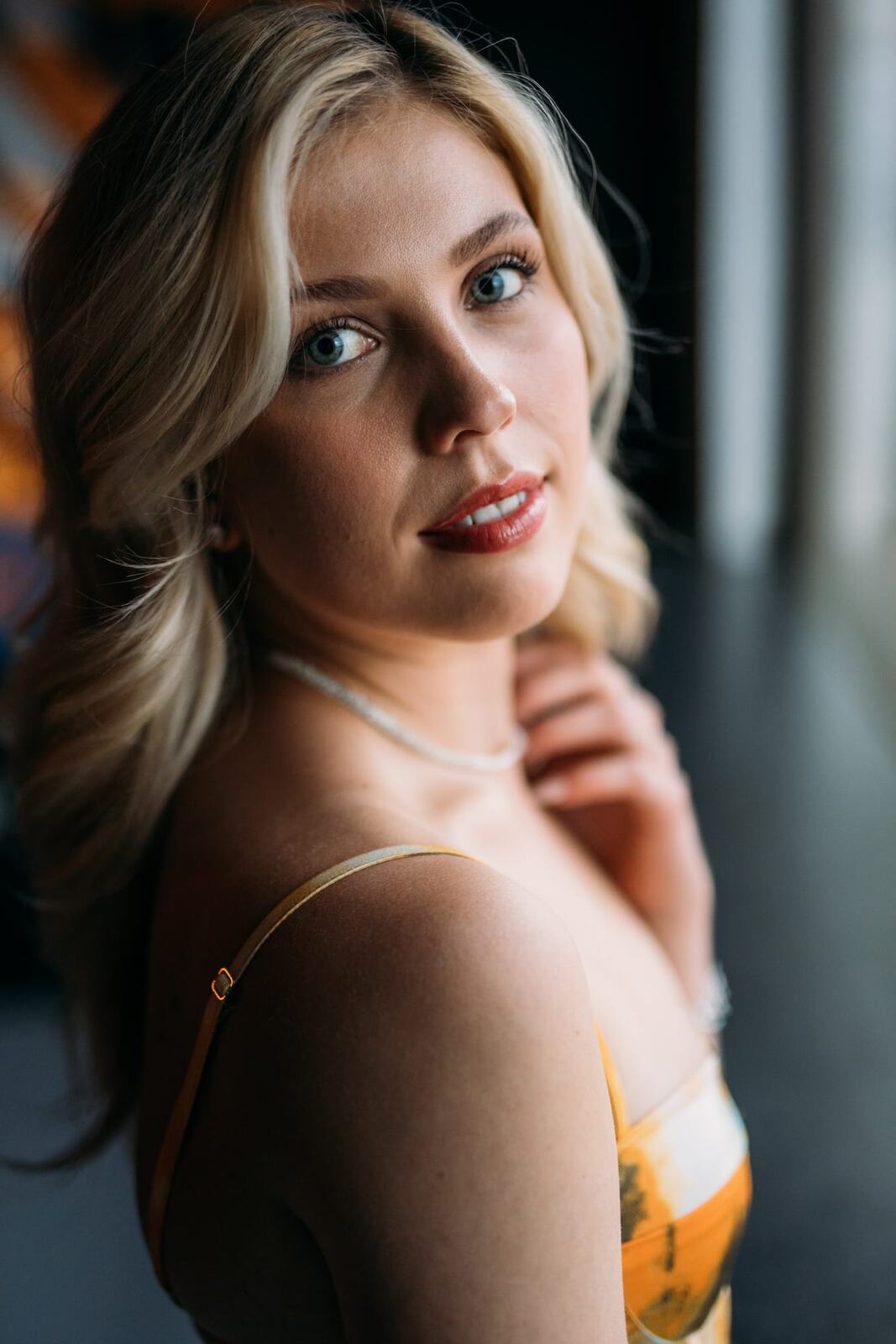 Kennedy Studio Set portraits story frame 7: Catsuit, gold dress, summer dress and polished studio setups with actor-friendly portrait range.