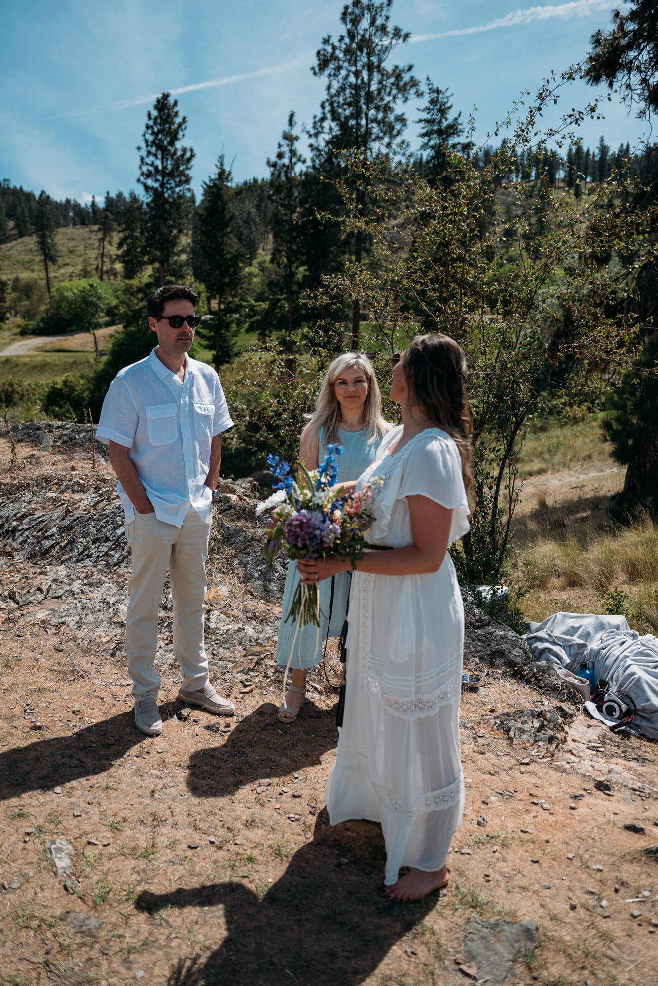 Kristina and Mark weddings story frame 7: A Bertram Creek wedding in South Kelowna with Okanagan Lake light, film-friend history, family texture and Lithuanian food and planning details..