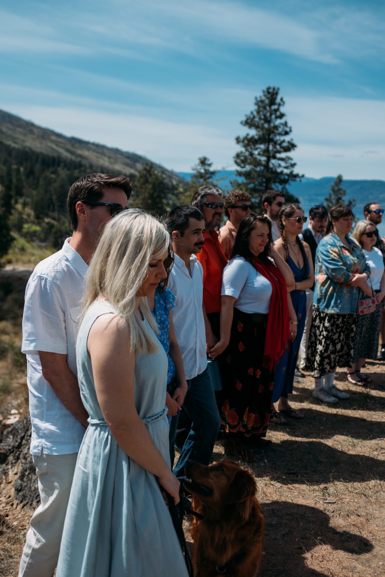 Kristina and Mark weddings story frame 8: A Bertram Creek wedding in South Kelowna with Okanagan Lake light, film-friend history, family texture and Lithuanian food and planning details..