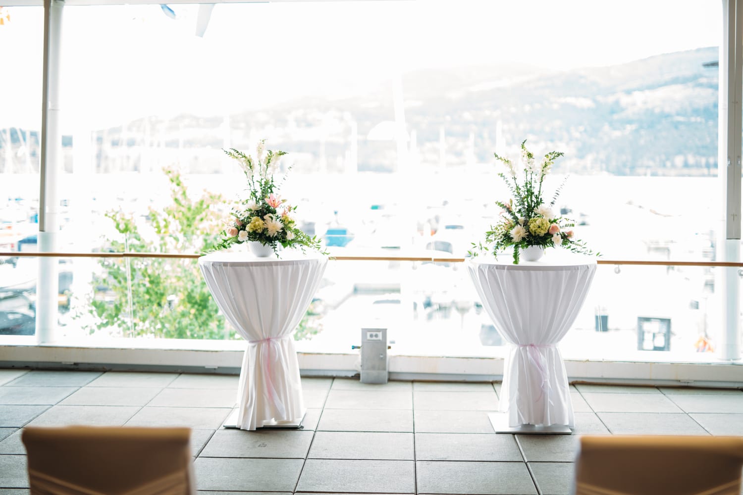Kristine and Mike weddings story frame 7: A small downtown Kelowna wedding at the Kelowna Yacht Club, with sweet family, detail frames, flattering angles and quiet waterfront polish..