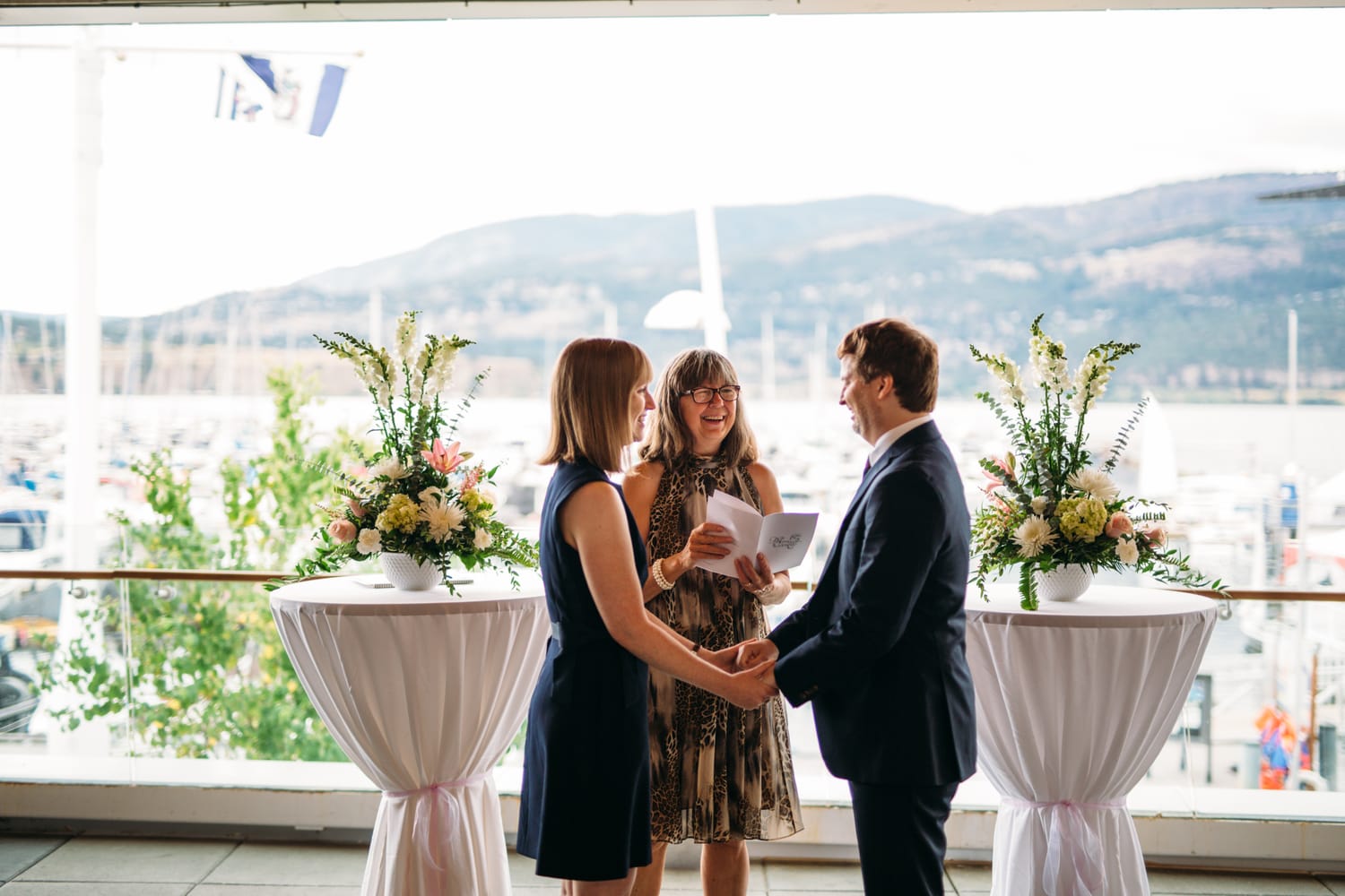 Kristine and Mike weddings story frame 10: A small downtown Kelowna wedding at the Kelowna Yacht Club, with sweet family, detail frames, flattering angles and quiet waterfront polish..
