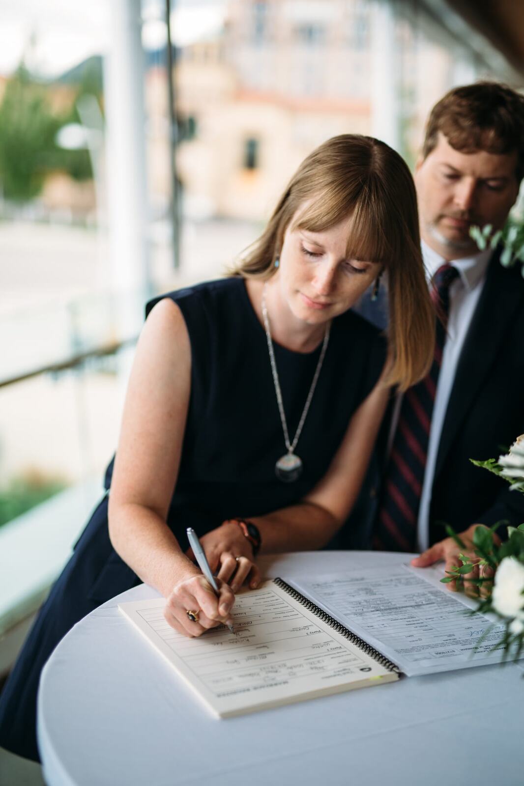 Kristine and Mike weddings story frame 14: A small downtown Kelowna wedding at the Kelowna Yacht Club, with sweet family, detail frames, flattering angles and quiet waterfront polish..