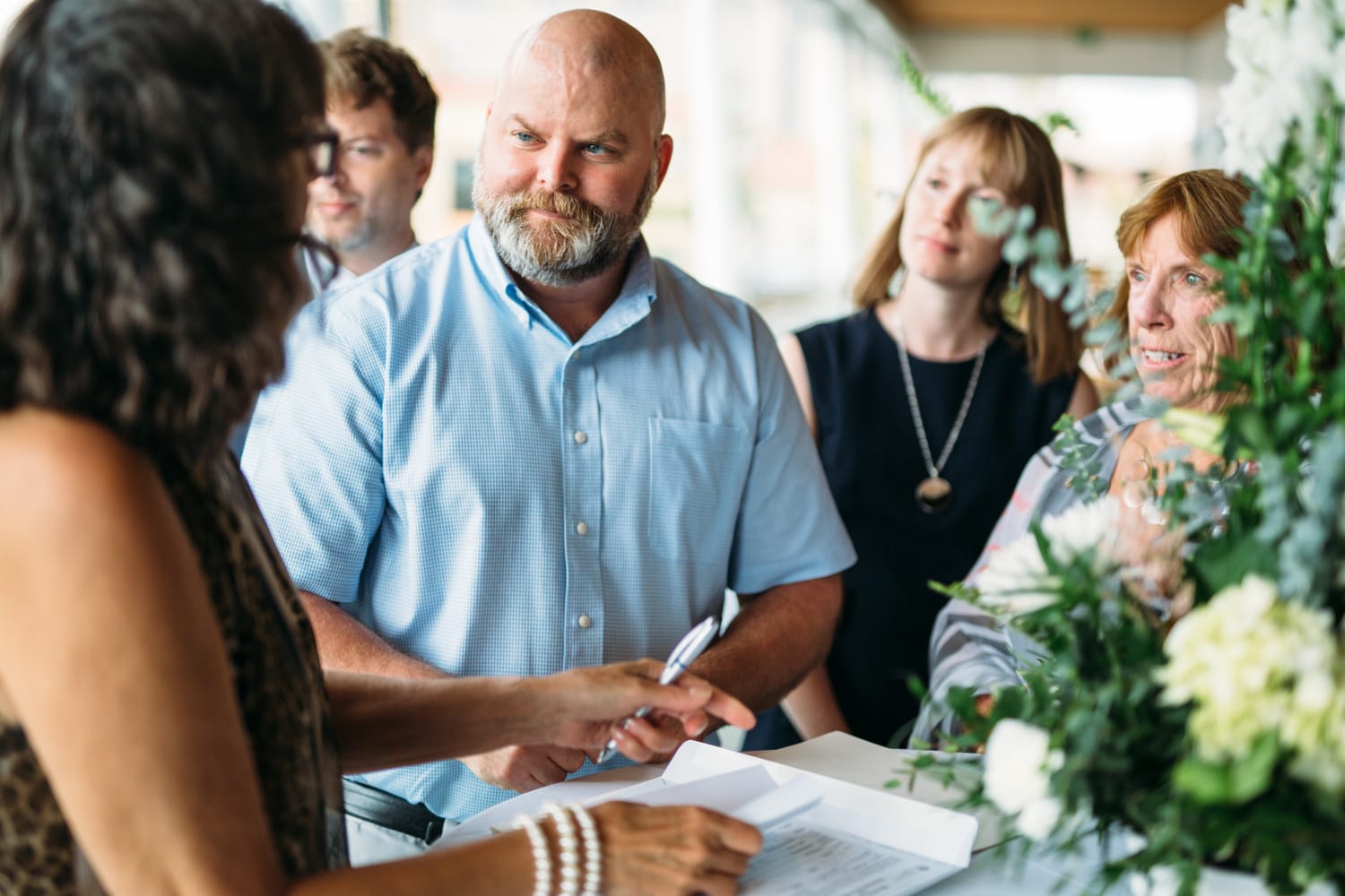 Kristine and Mike weddings story frame 16: A small downtown Kelowna wedding at the Kelowna Yacht Club, with sweet family, detail frames, flattering angles and quiet waterfront polish..