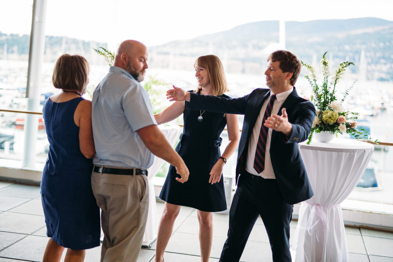 Kristine and Mike weddings story frame 18: A small downtown Kelowna wedding at the Kelowna Yacht Club, with sweet family, detail frames, flattering angles and quiet waterfront polish..
