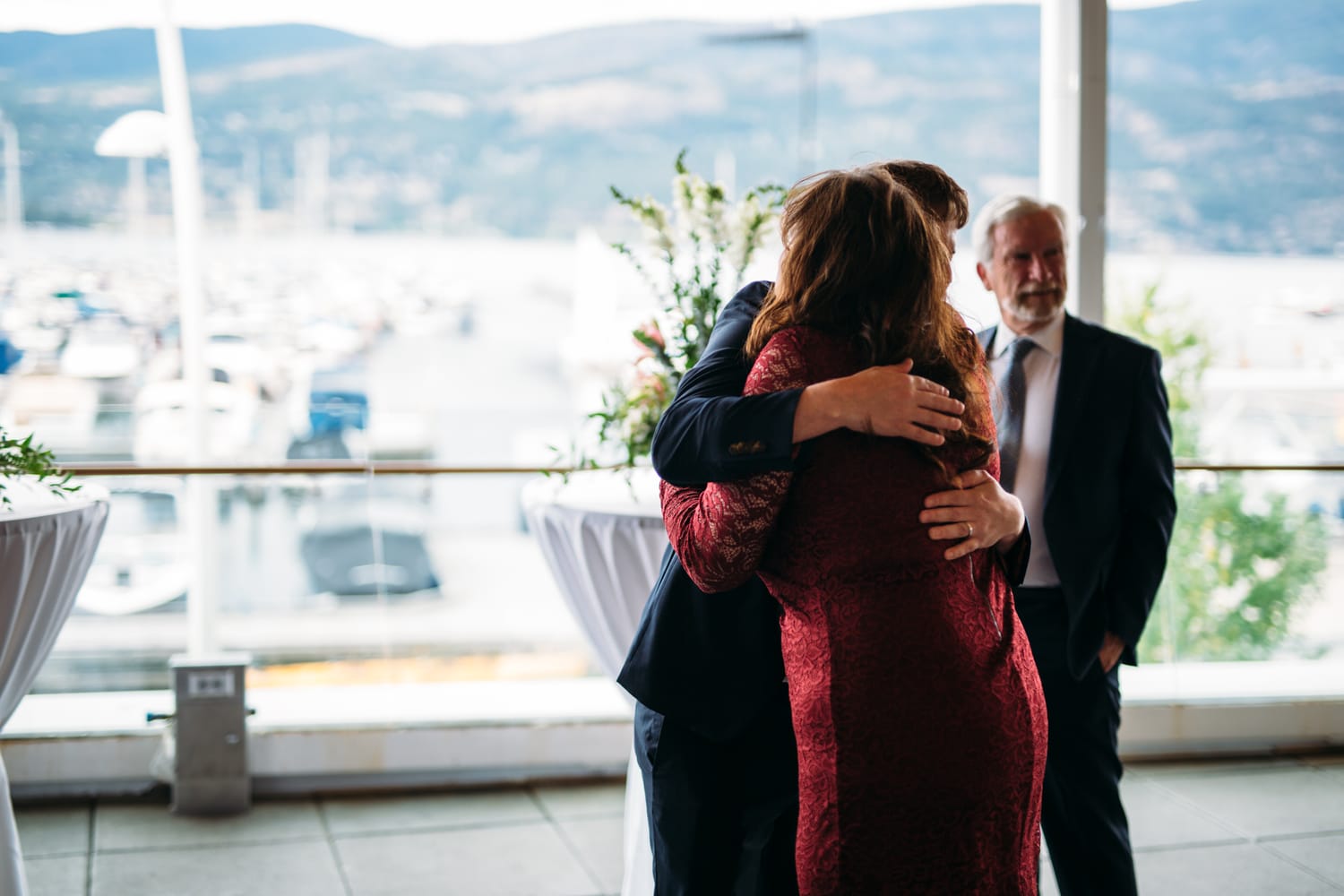 Kristine and Mike weddings story frame 19: A small downtown Kelowna wedding at the Kelowna Yacht Club, with sweet family, detail frames, flattering angles and quiet waterfront polish..