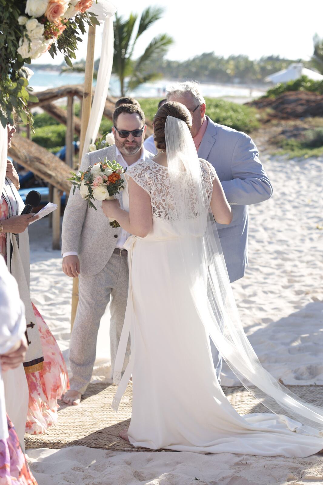 Kyra arriving at the ceremony on Xpu-Ha Beach