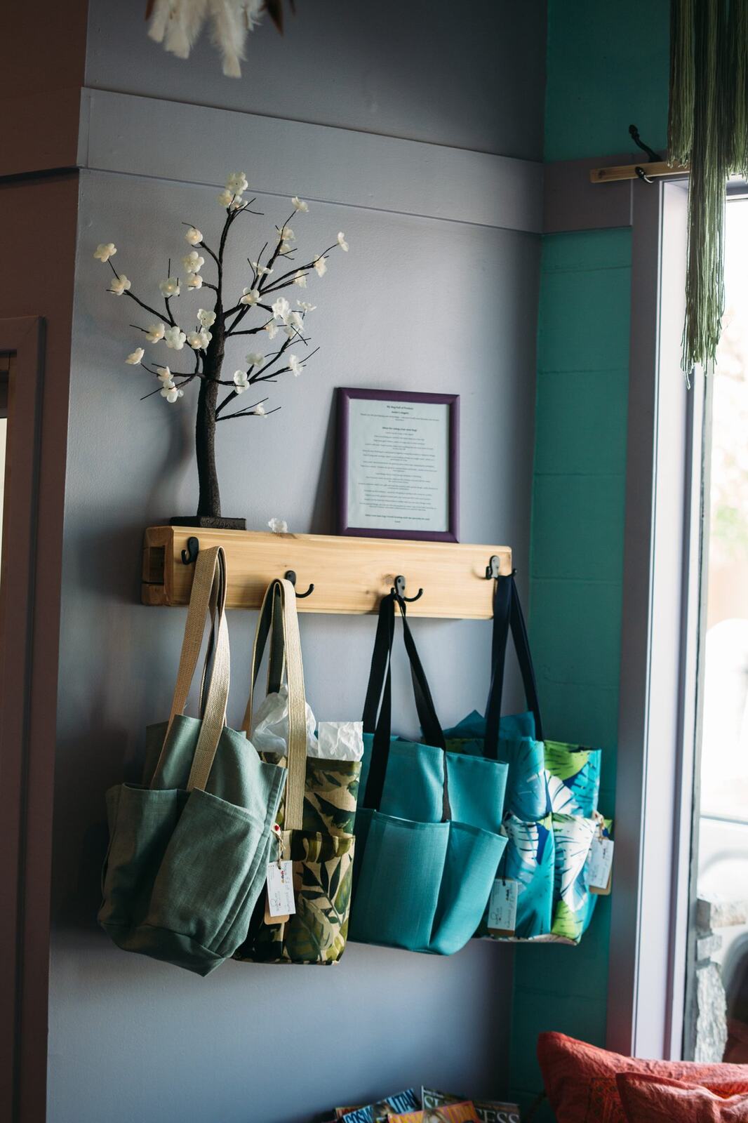Lavender Lotus corporate story frame 22: Wellness brand photography for Lavender Lotus in Salmon Arm, BC, with interiors, product details, owner portraits, staff portraits and treatment-room atmosphere for a local wellness business..