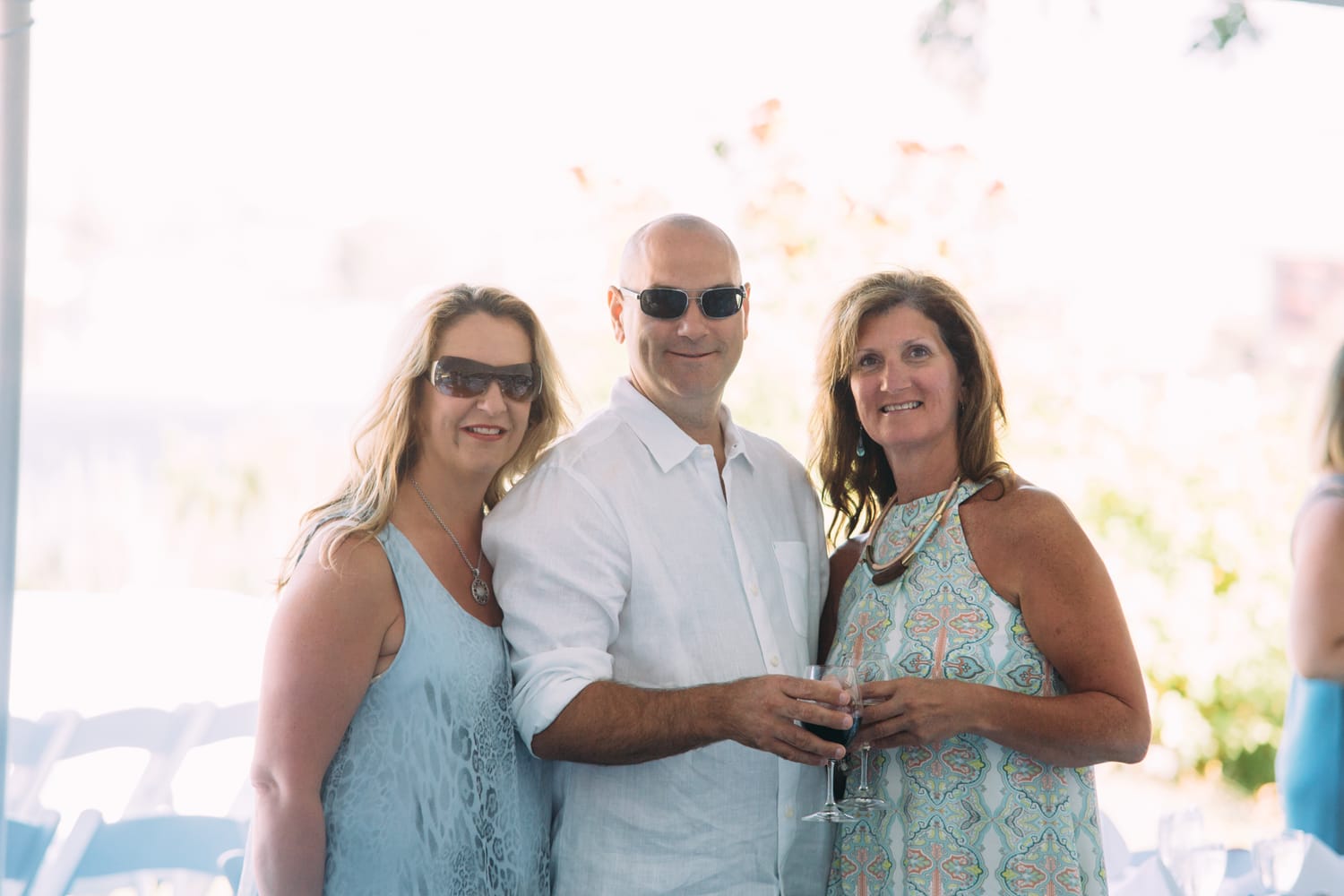 Leeanne and Kelly weddings story frame 11: A Watermark Beach Resort wedding in Osoyoos, built around lakefront context, grown-family connection and careful, big-hearted coverage..