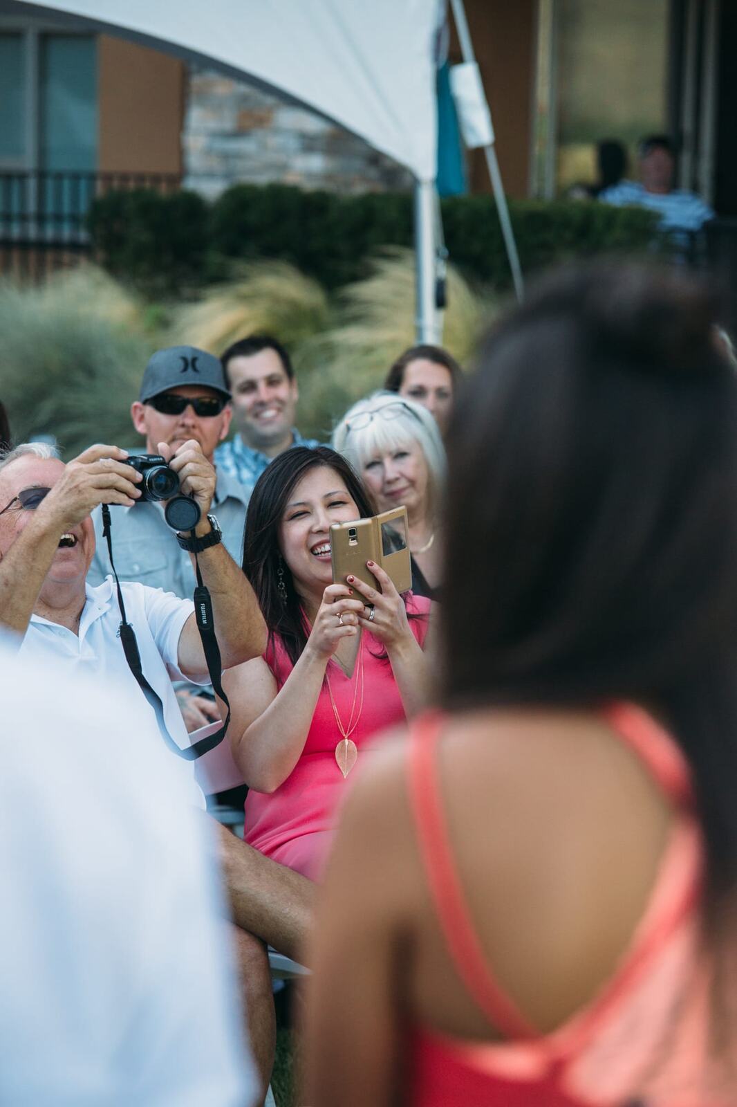 Leeanne and Kelly weddings story frame 16: A Watermark Beach Resort wedding in Osoyoos, built around lakefront context, grown-family connection and careful, big-hearted coverage..