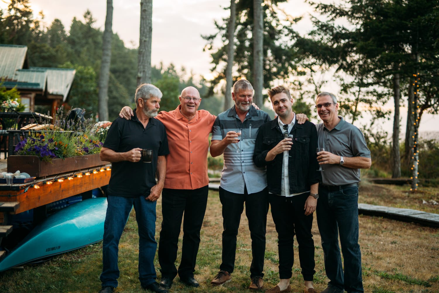 Mara and Casey weddings story frame 12: A Vancouver Island private-home wedding near Qualicum Beach, with Bowser prep, Friday gathering energy, custom vendors, kids, friends and cool Island air..