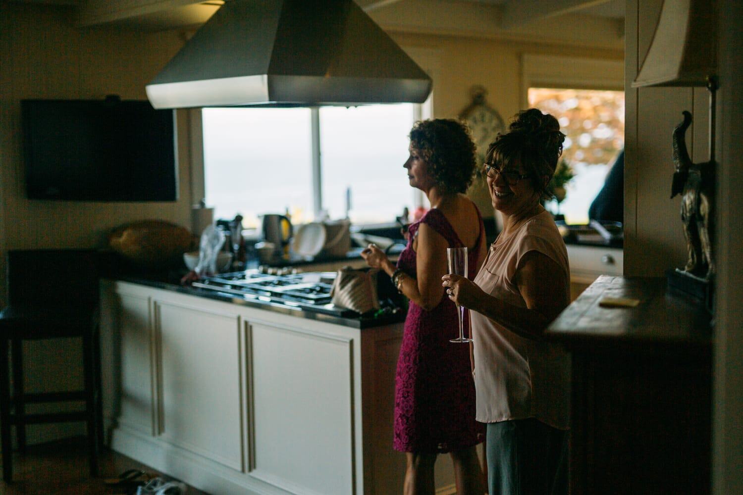 Mara and Casey weddings story frame 3: A Vancouver Island private-home wedding near Qualicum Beach, with Bowser prep, Friday gathering energy, custom vendors, kids, friends and cool Island air..